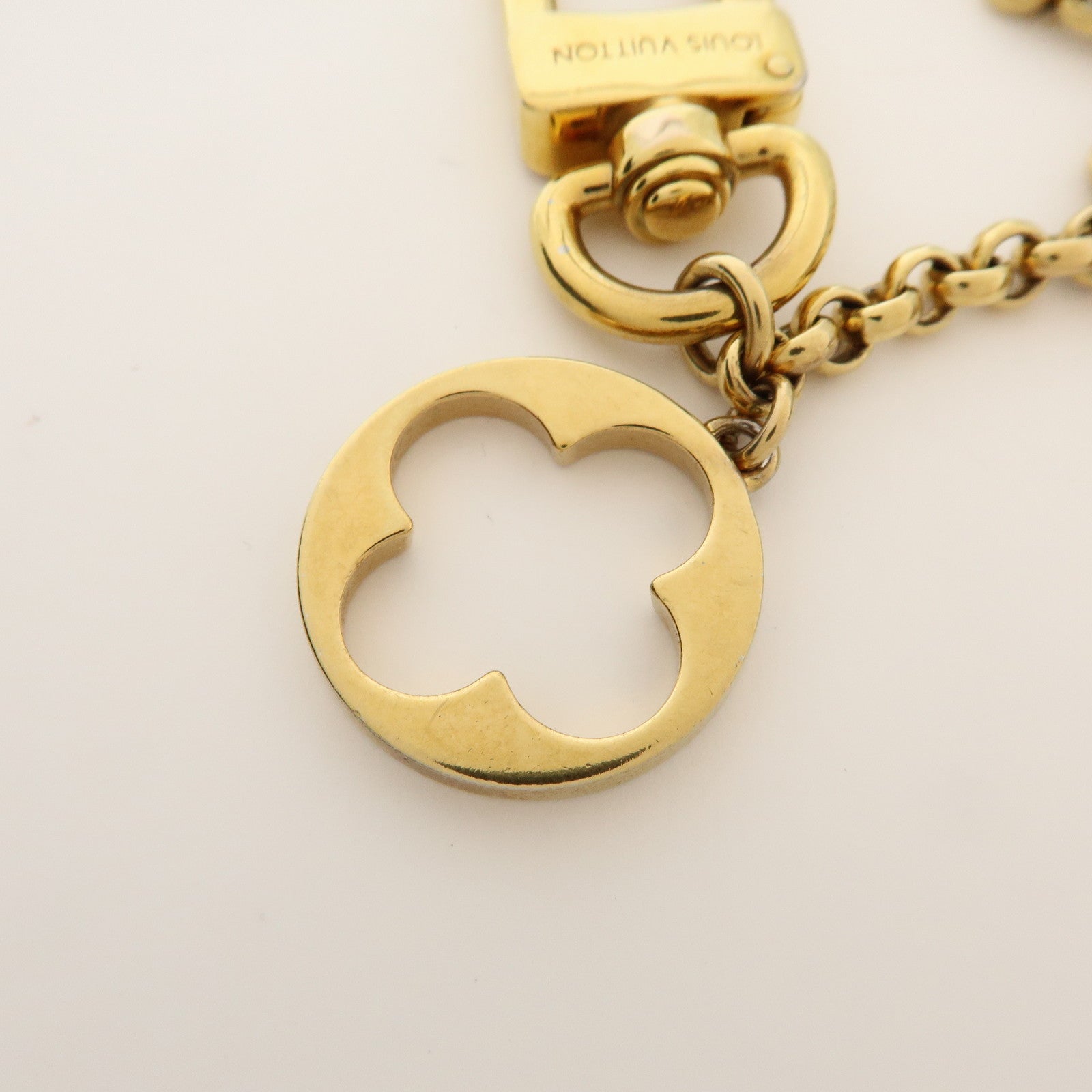 Louis Vuitton Fleur de Monogram Bag Charm Key Chain Gold M65111