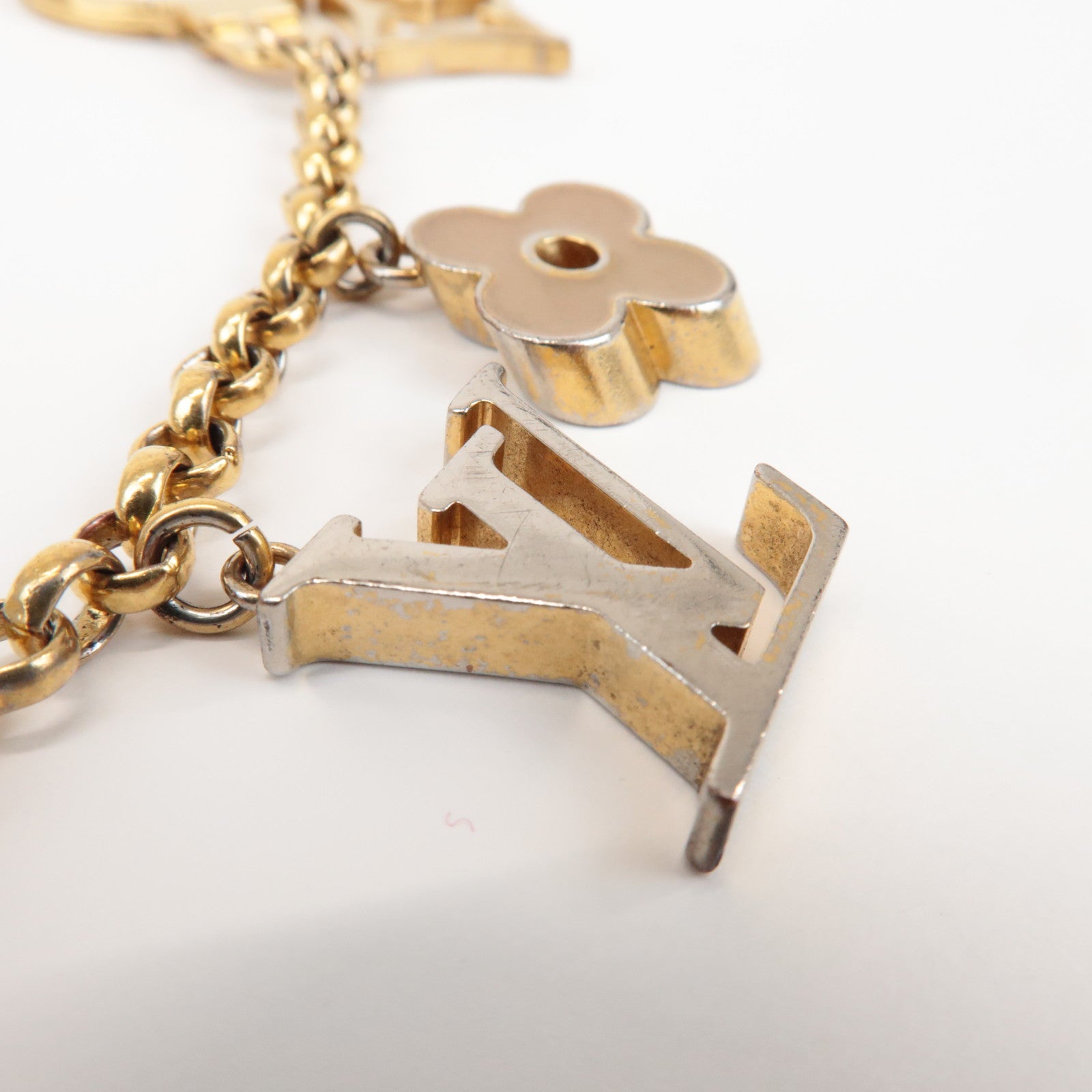 Louis Vuitton Fleur de Monogram Bag Charm Key Chain Gold M65111