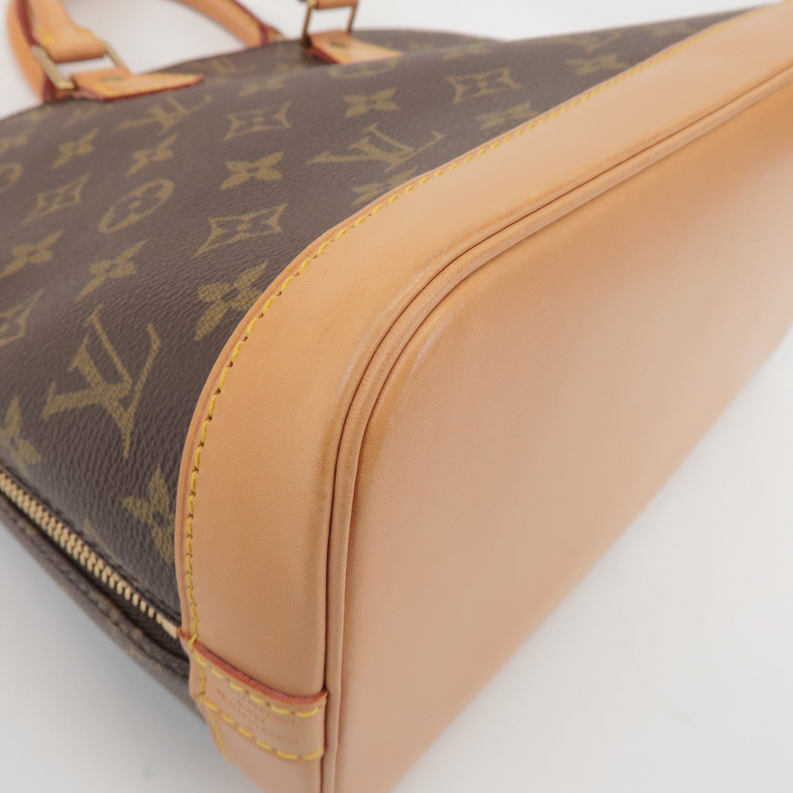 Louis Vuitton Monogram Alma Hand Bag Brown M51130