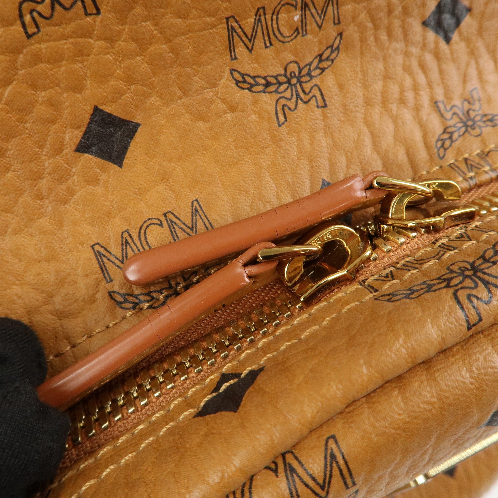 MCM Visetos PVC Leather Backpack Rucksack Studs Cognac