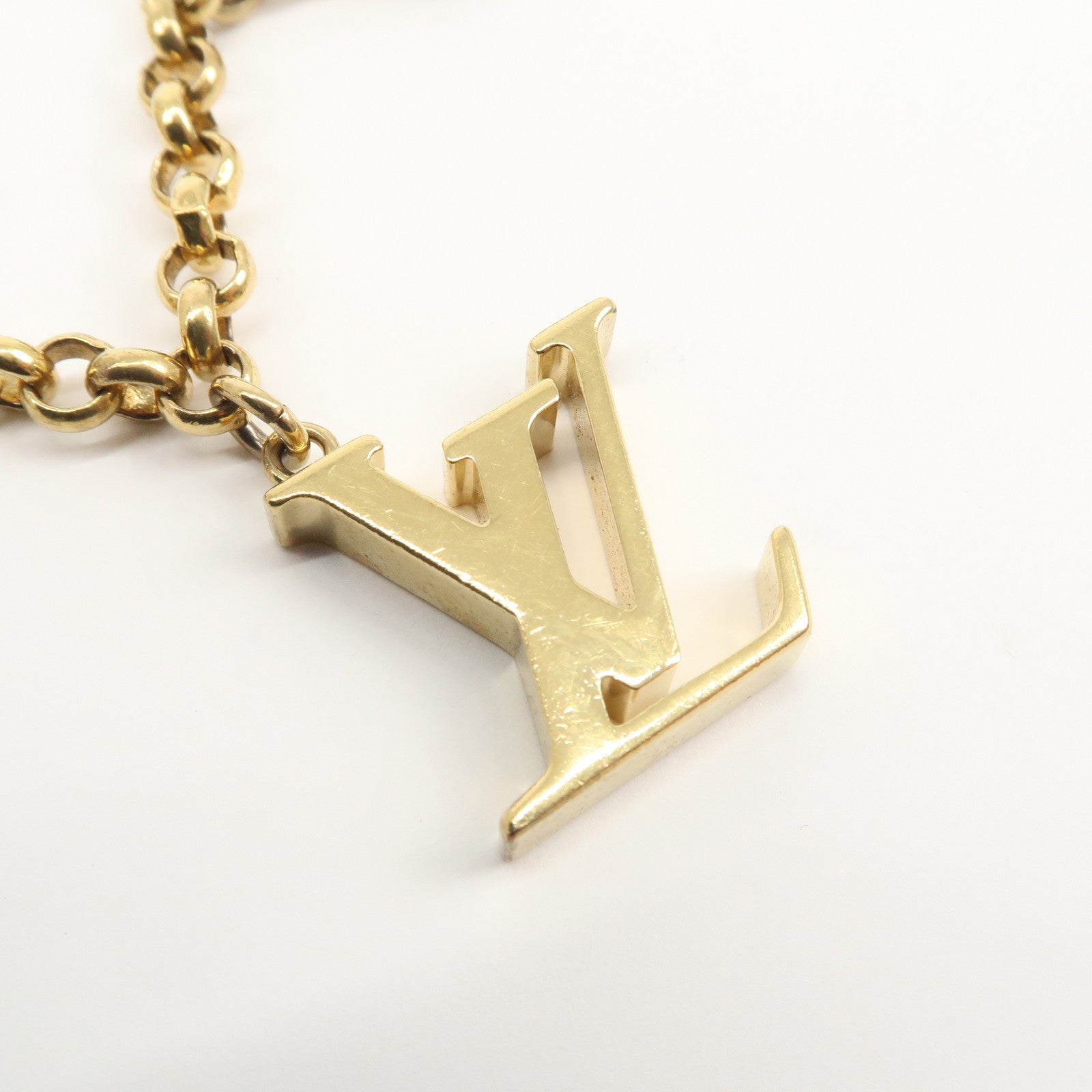 Louis Vuitton Fleur de Monogram Bag Charm Key Chain Gold M65111