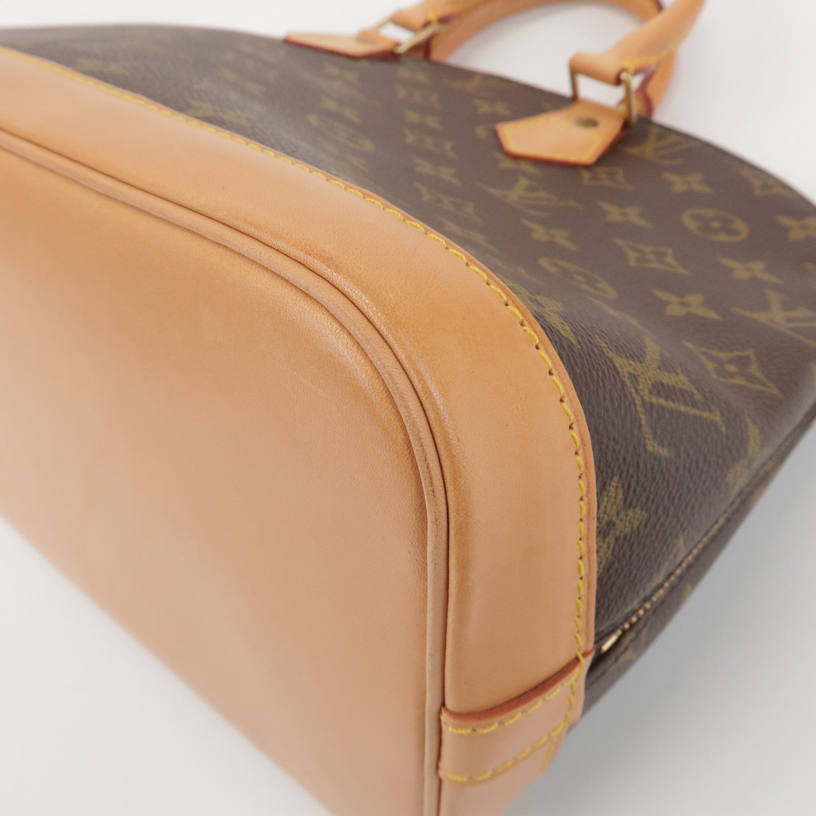 Louis Vuitton Monogram Alma Hand Bag Brown M51130