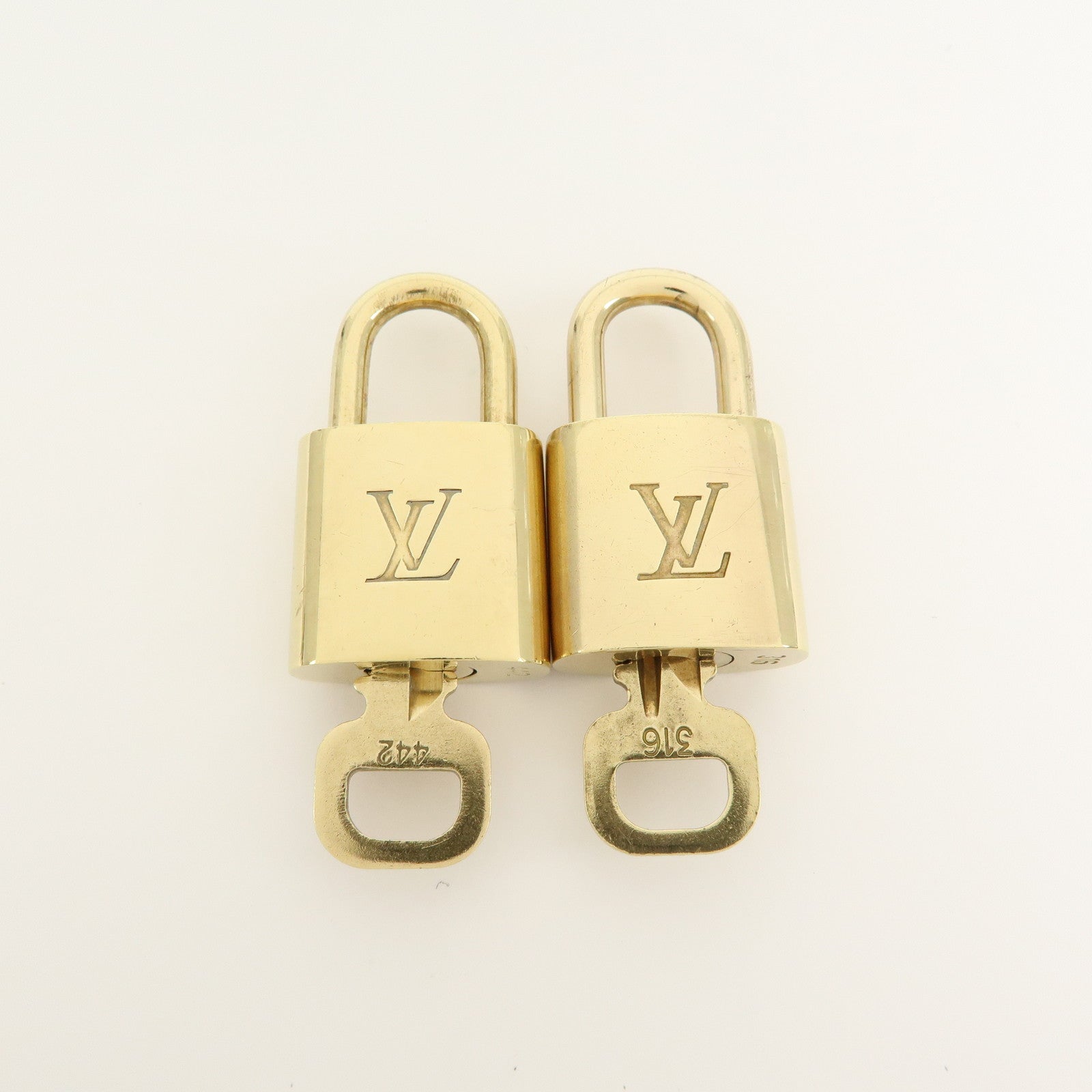 Louis Vuitton Set of 10 Lock & Key Cadena Key Lock Gold