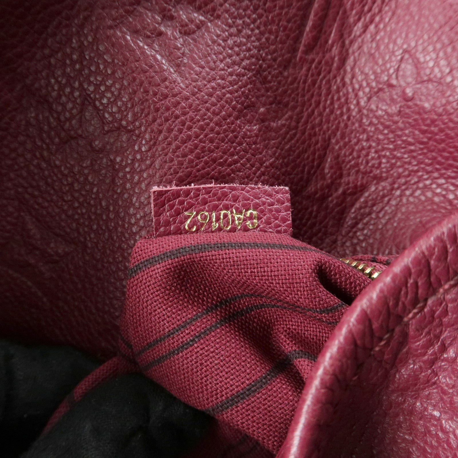 Louis Vuitton Monogram Empreinte Empreinte Leather MM Aurore M94047