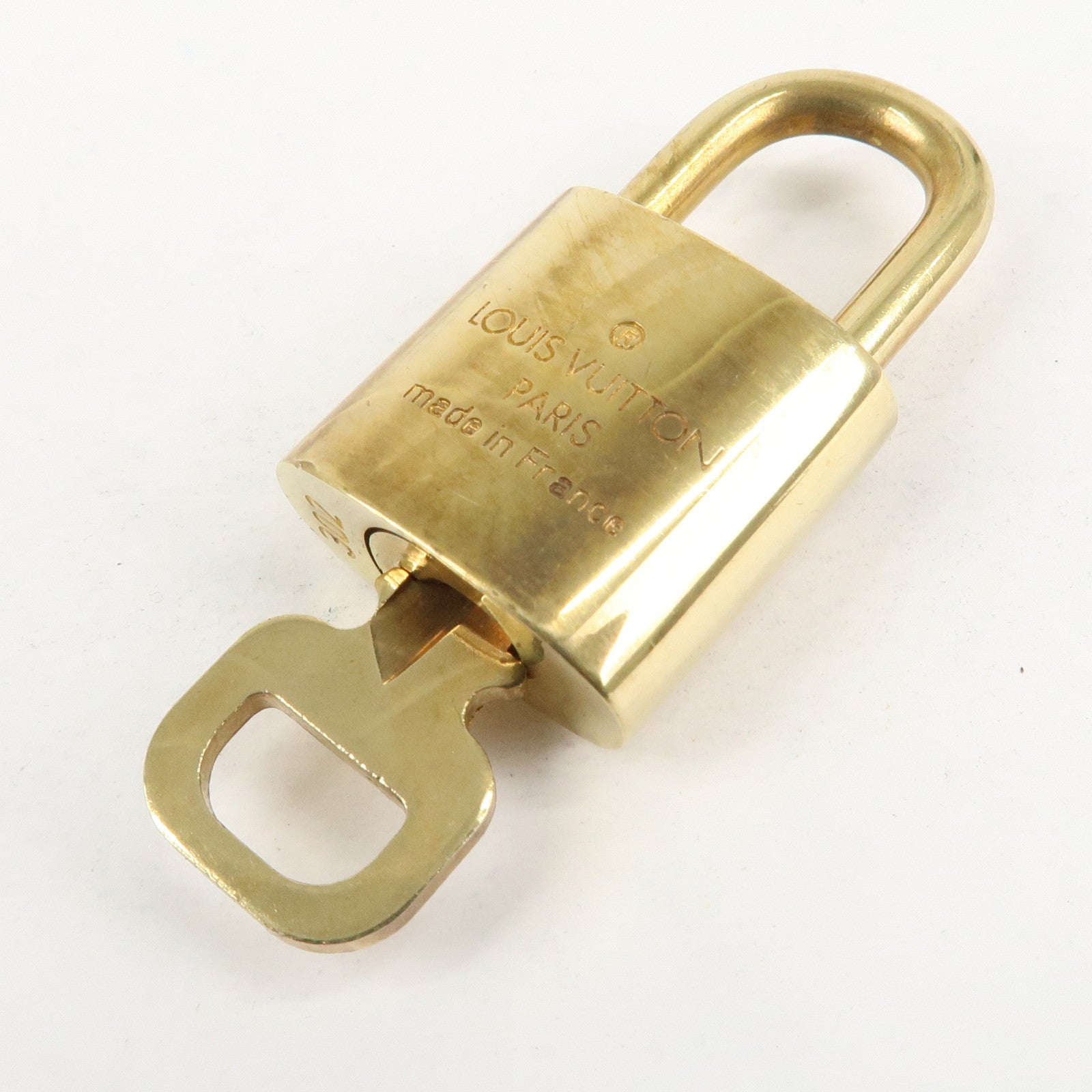 Louis Vuitton Set of 10 Lock & Key Cadena Key Lock Metal Gold