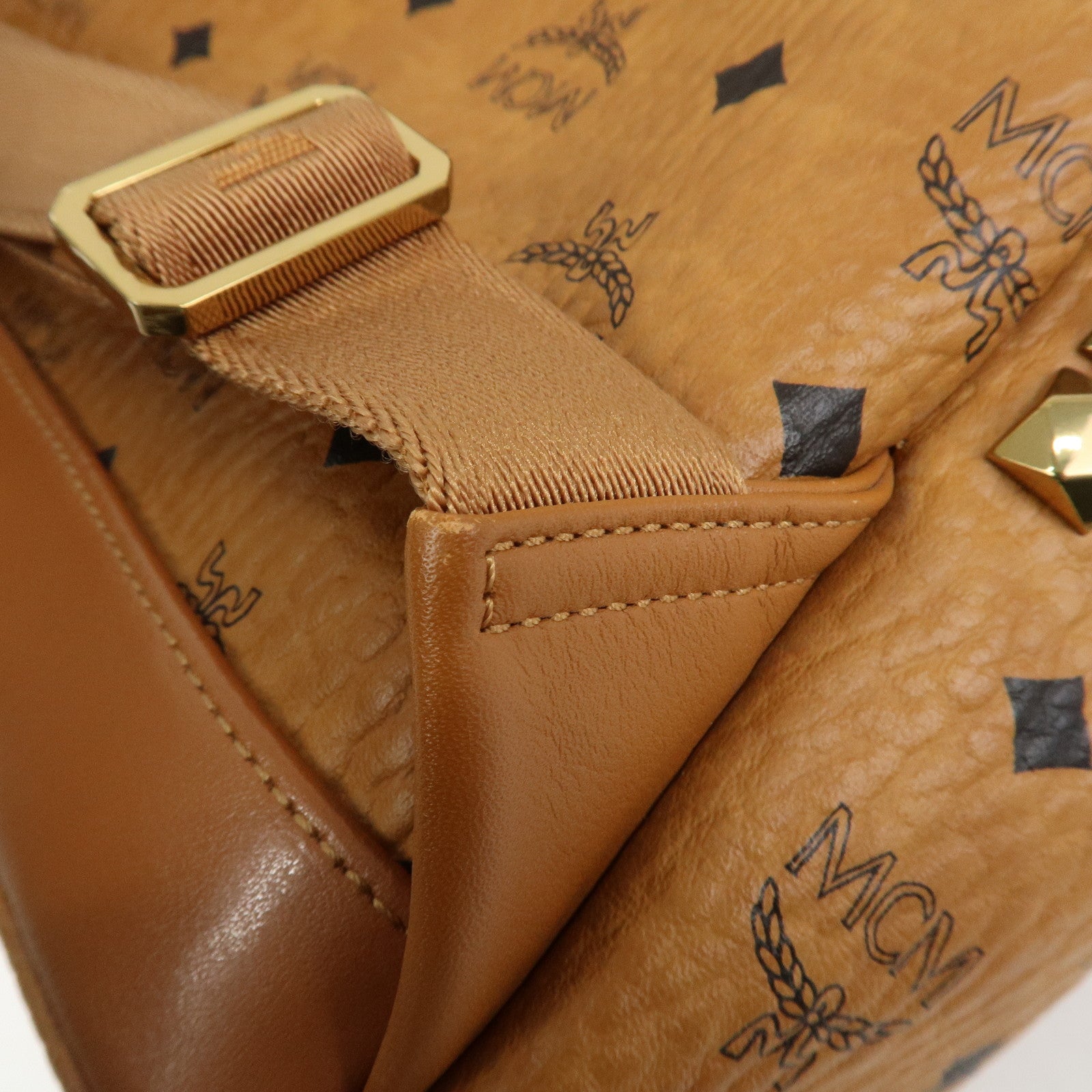 MCM Visetos PVC Leather Backpack Rucksack Studs Cognac
