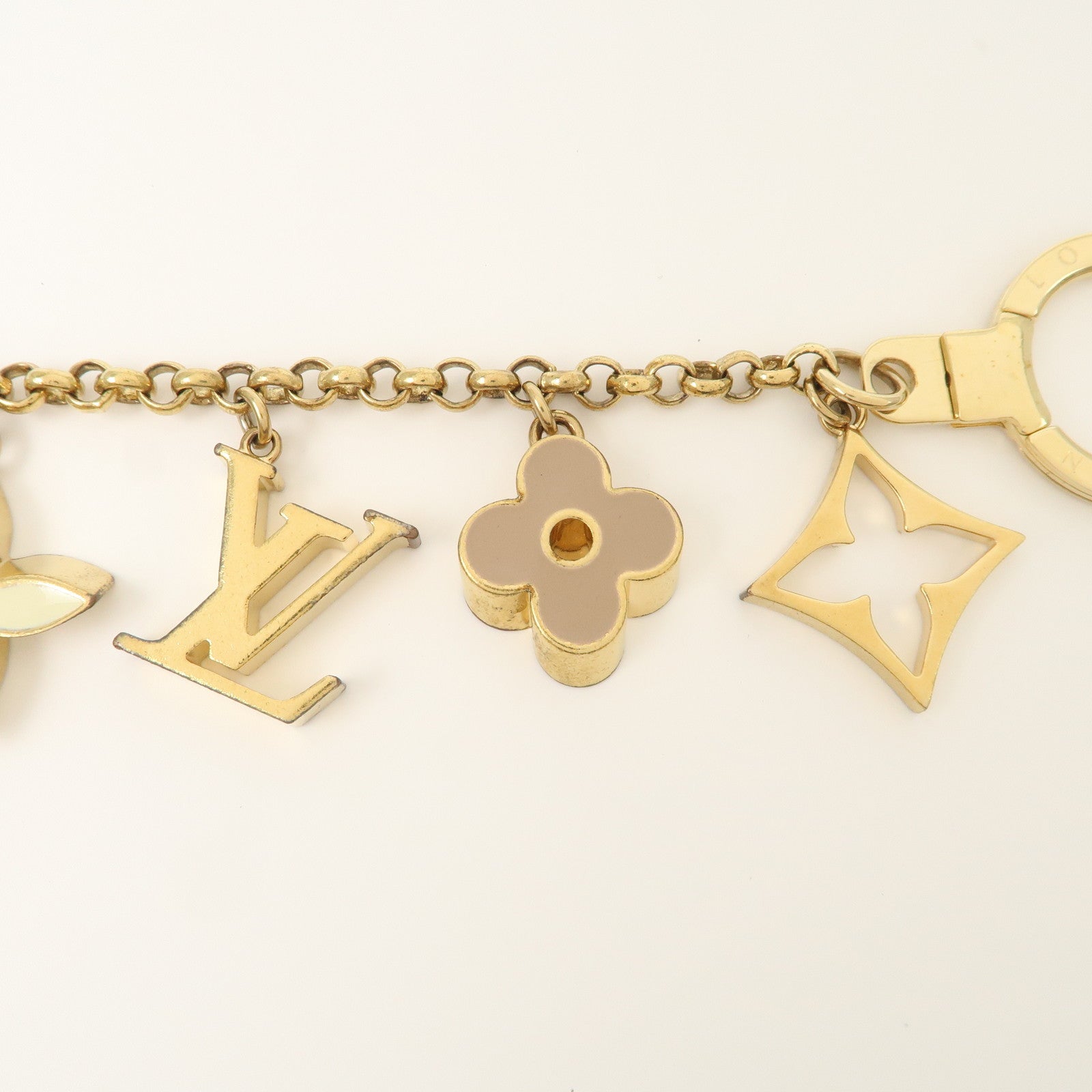 Louis Vuitton Fleur de Monogram Bag Charm Key Chain Gold M65111