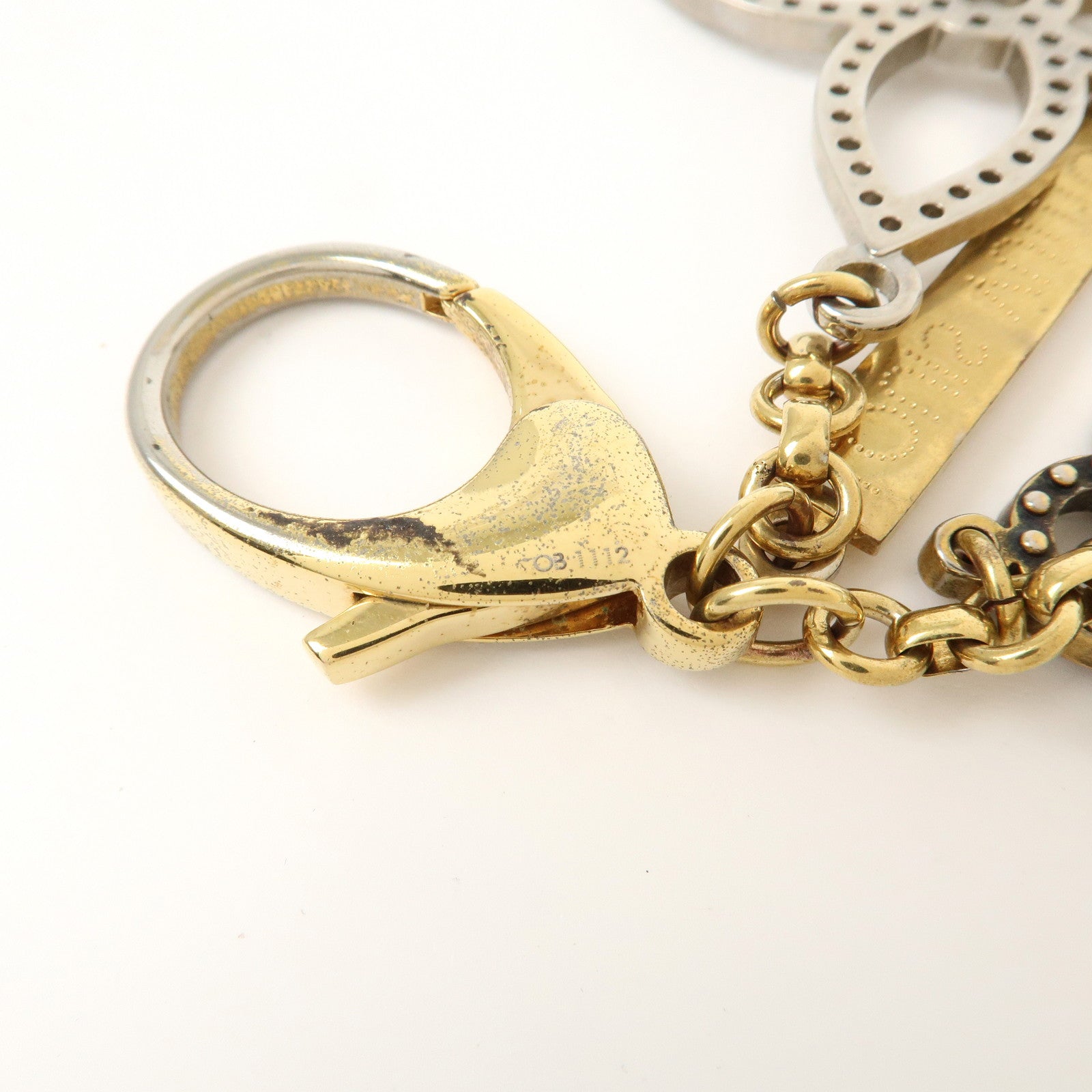 Louis Vuitton Monogram Bijoux Sac Tapage Bag Charm Gold M66350