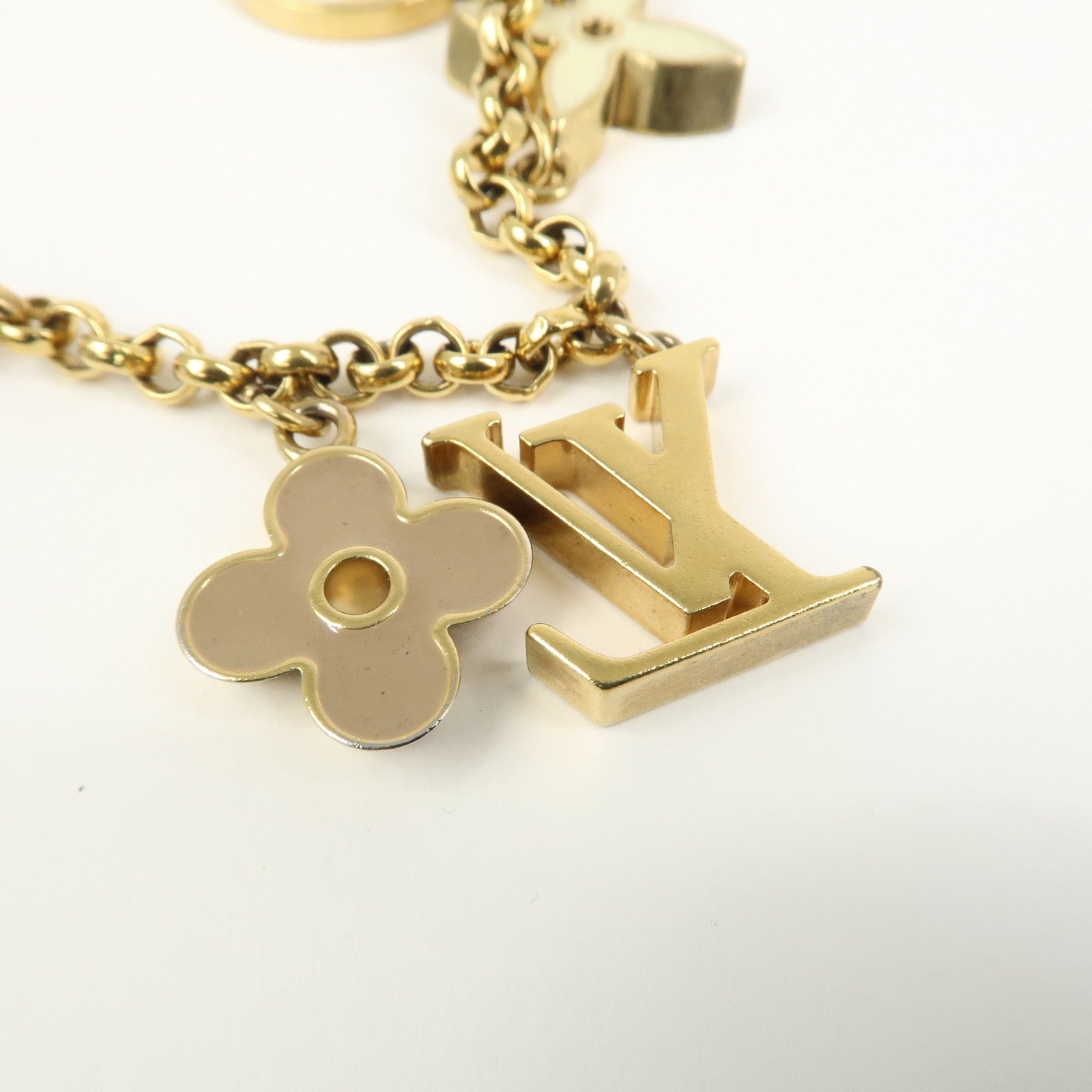 Louis Vuitton Fleur de Monogram Bag Charm Key Chain Gold M65111