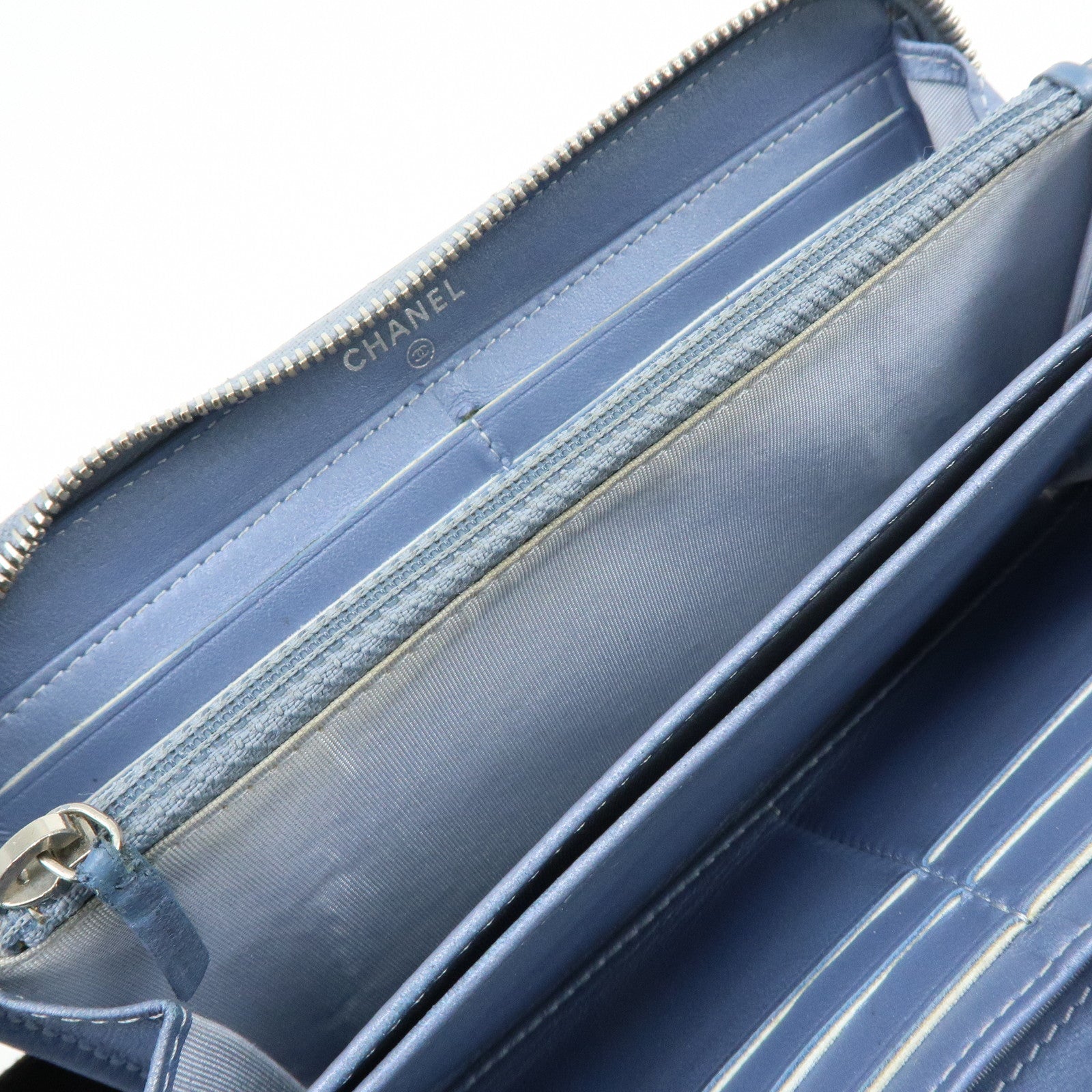 CHANEL Camellia Lamb Skin Round Zippy Wallet Light Blue A82281