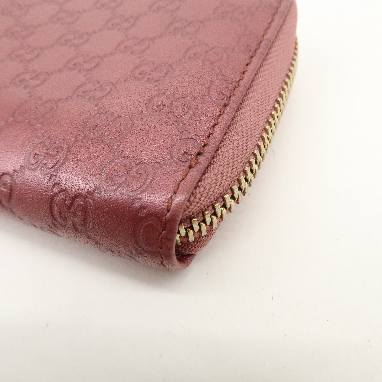 GUCCI Micro Guccissima Leather Round Zippy Coin Case 255452