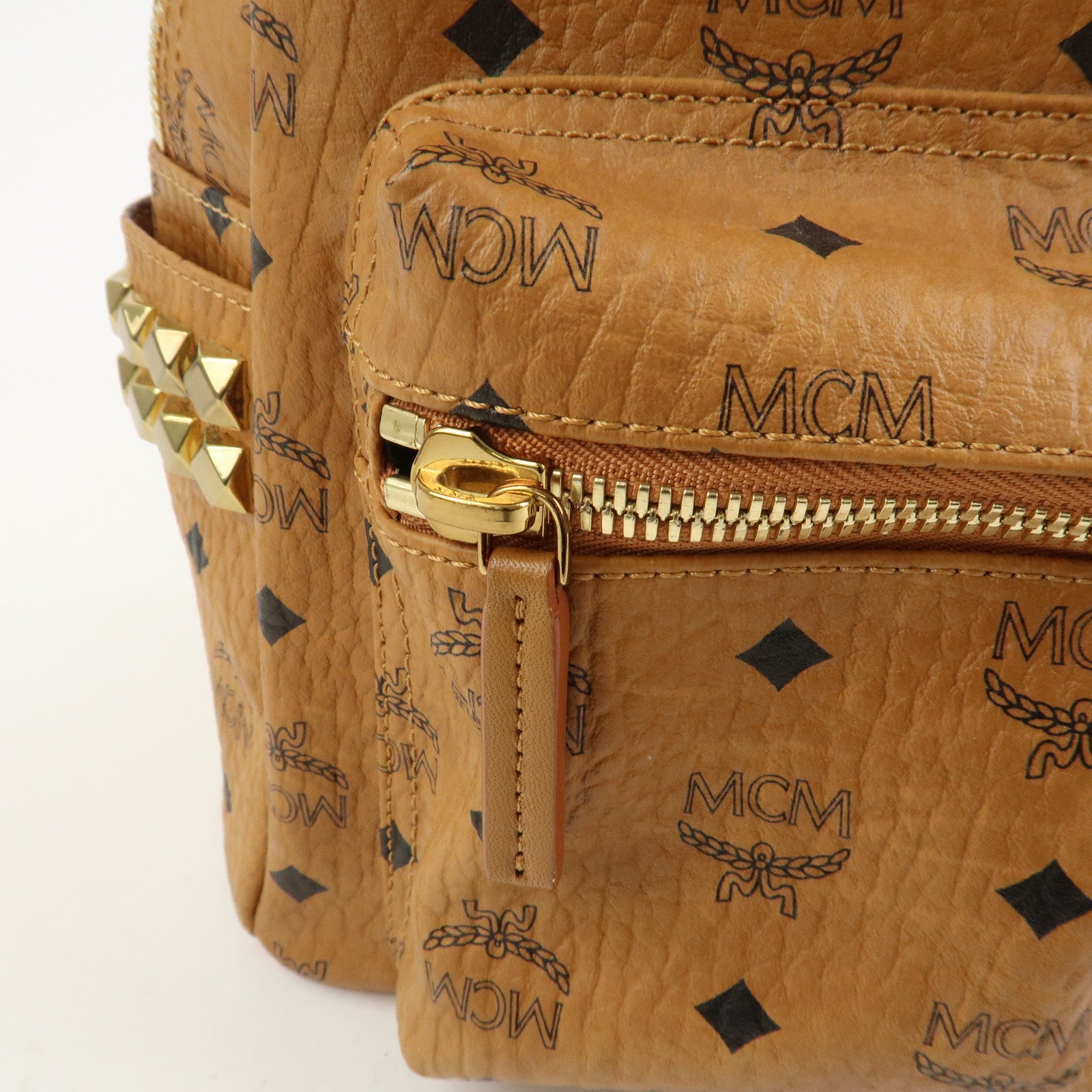 MCM Visetos PVC Leather Backpack Rucksack Studs Cognac
