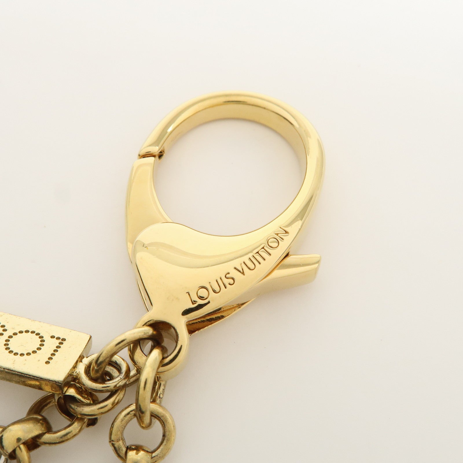 Louis Vuitton Bijoux Sac Tapage Bag Charm Gold Silver Black M65090