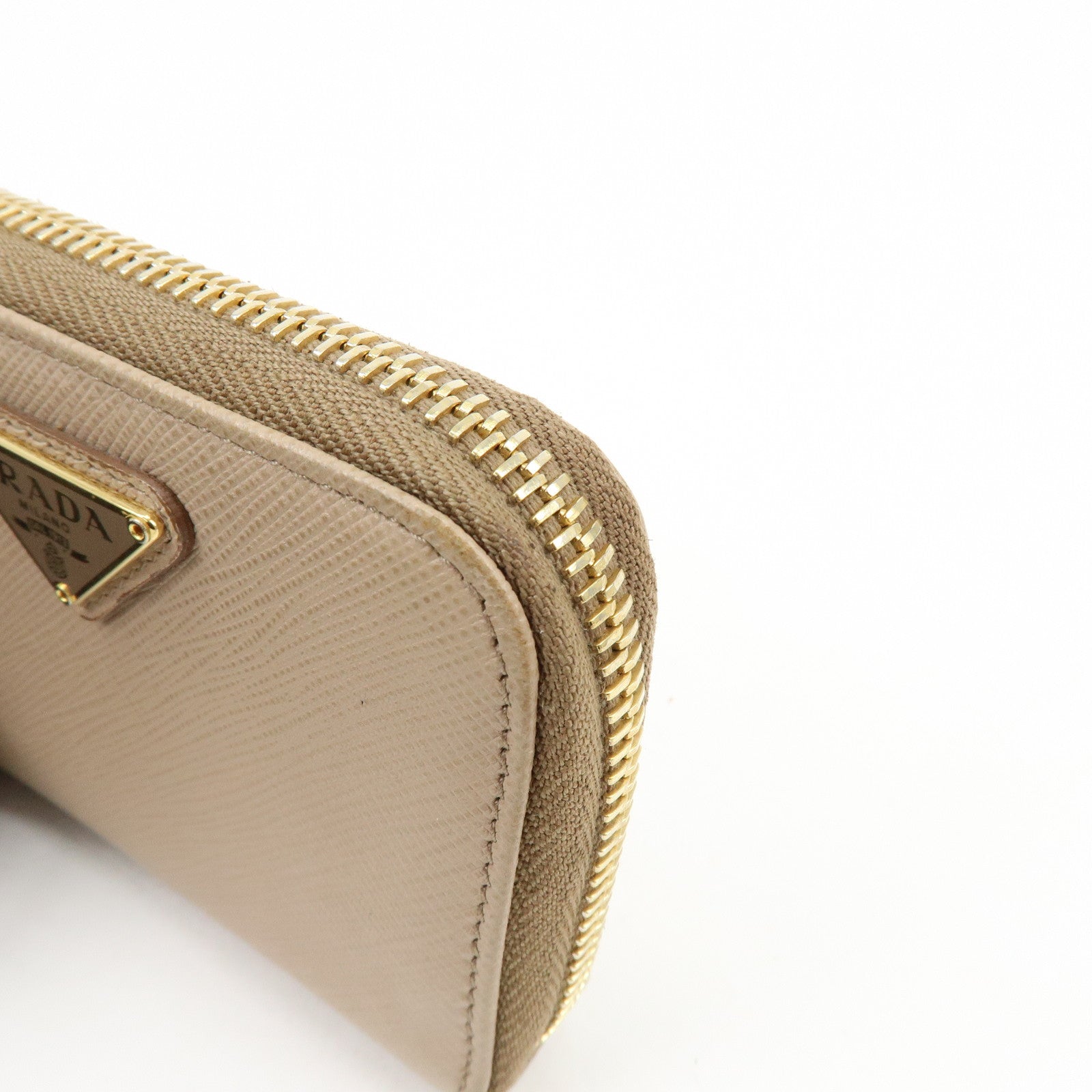 PRADA Triangle Logo Saffiano Leather Round Zippy Compact Wallet