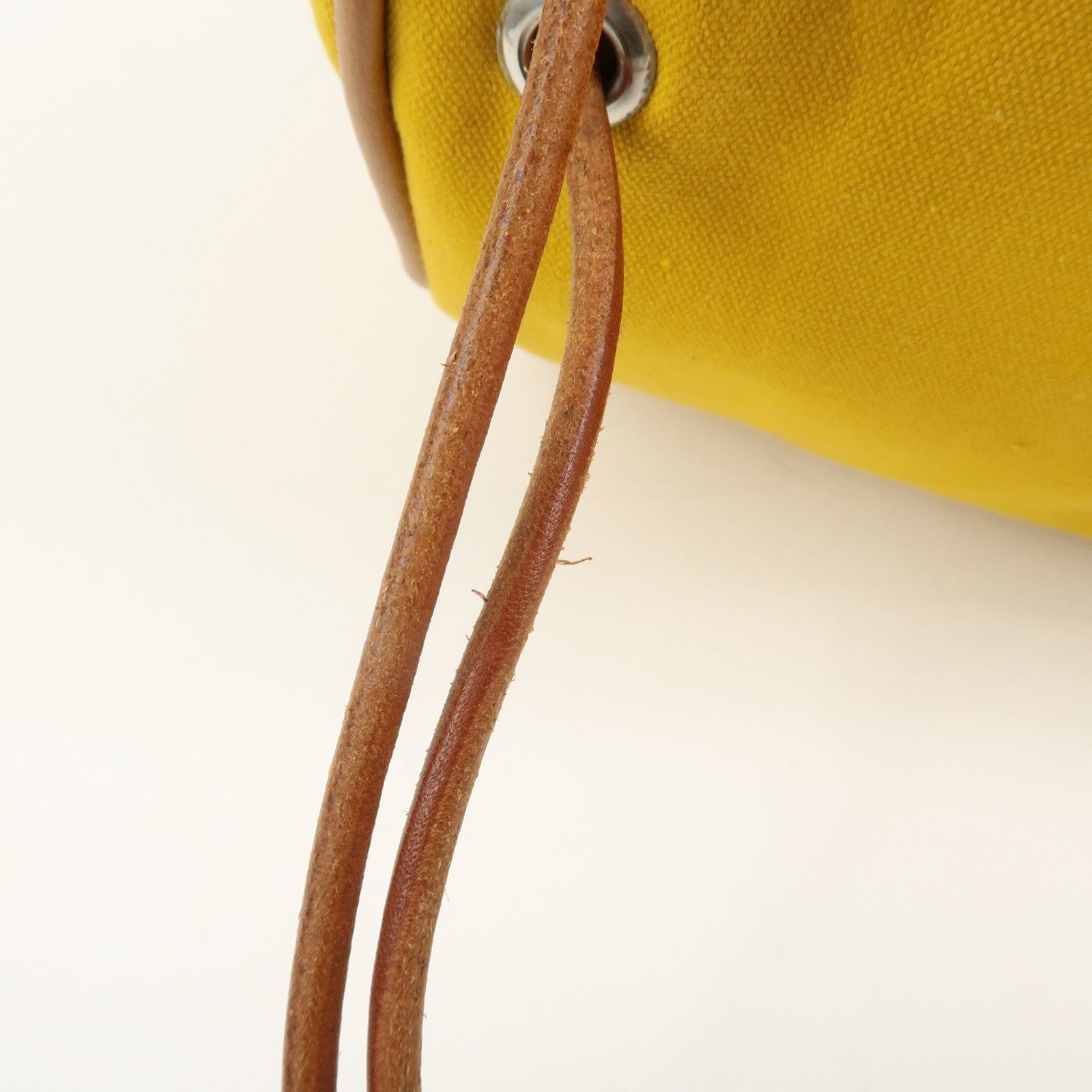 HERMES Porochon Mimil GM Canvas Leather Drawstring Backpack Yellow