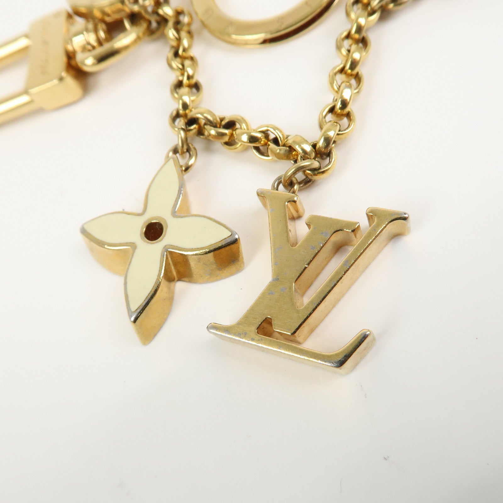Louis Vuitton Fleur de Monogram Bag Charm Key Chain Gold M65111