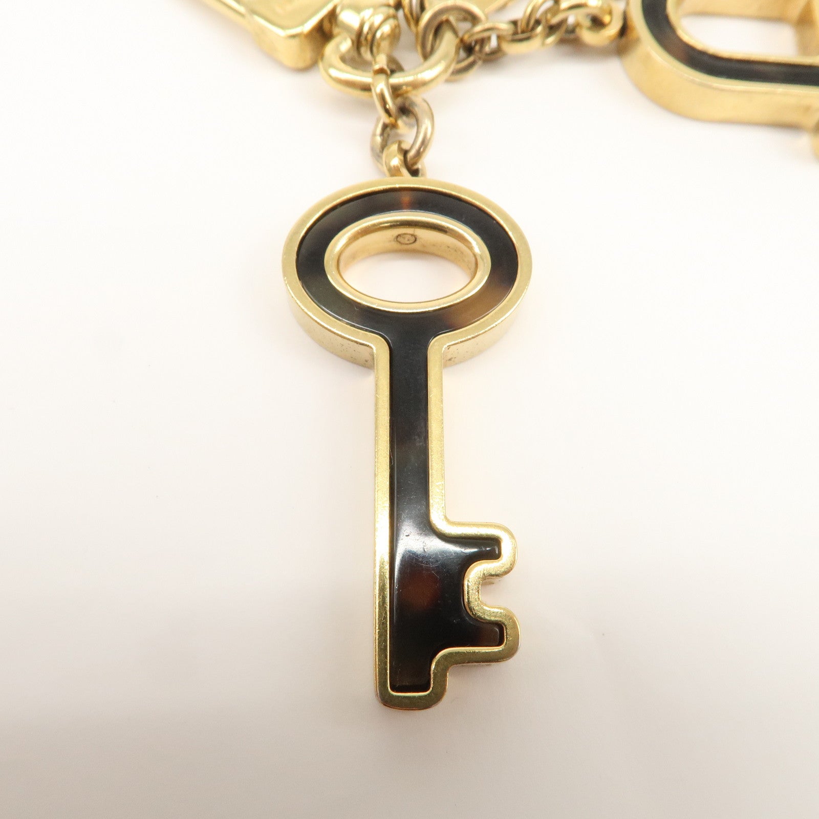 Louis Vuitton Porte Cles Confidence Bag Charm Key Chain Gold M65088