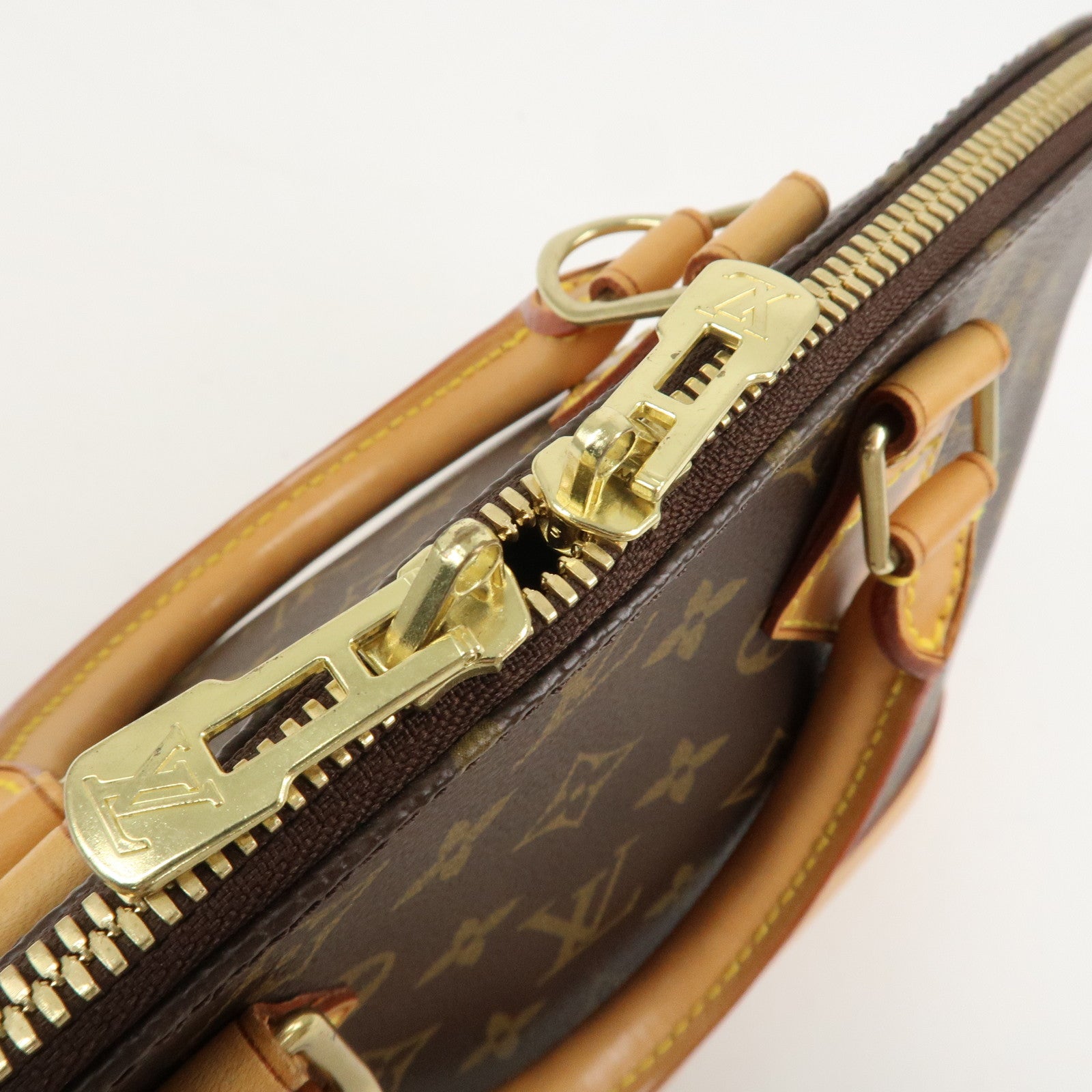 Louis Vuitton Monogram Alma Hand Bag Brown M51130