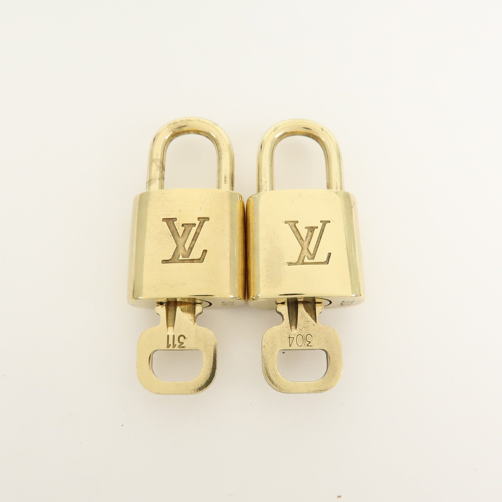 Louis Vuitton Set of 10 Lock & Key Cadena Key Lock Gold
