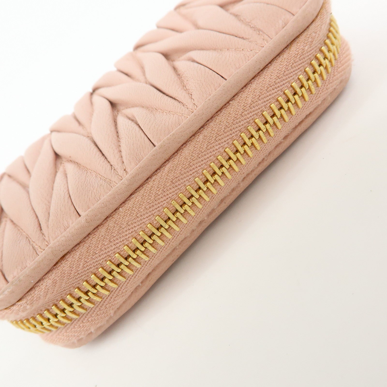 MIU MIU Matelasse Nappa Leather Compact Zippy Wallet Pink