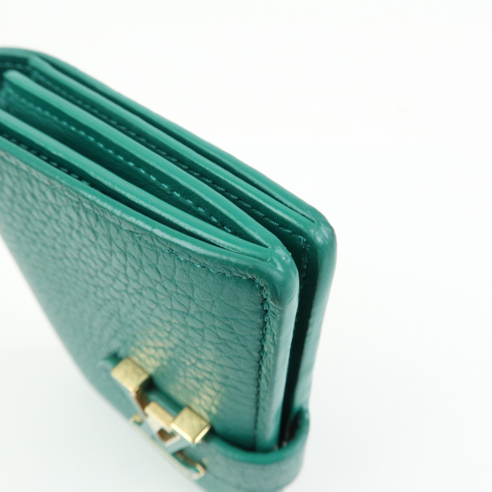 Louis Vuitton Taurillon Leather Vertical Compact Wallet M82438