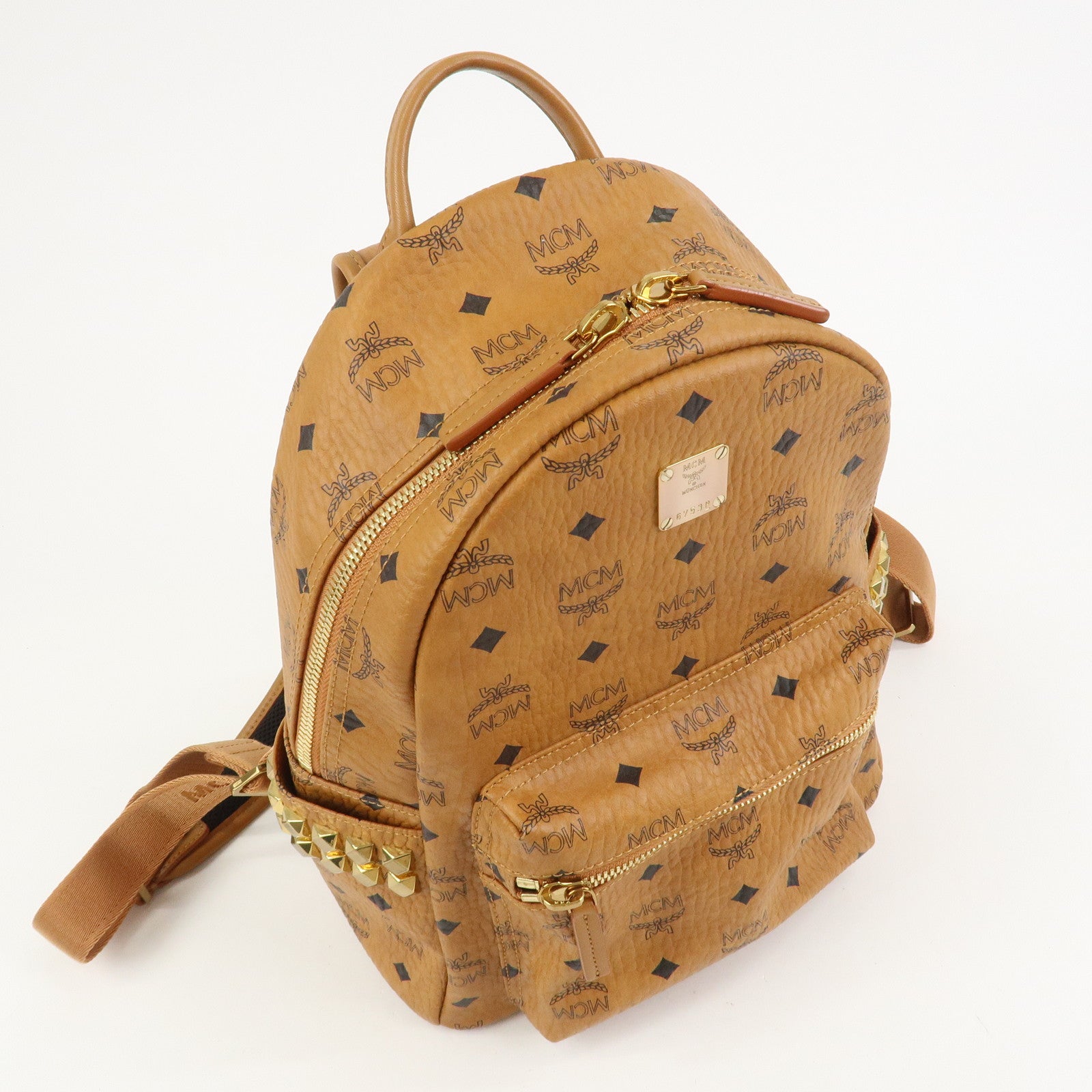MCM Visetos PVC Leather Backpack Rucksack Studs Cognac