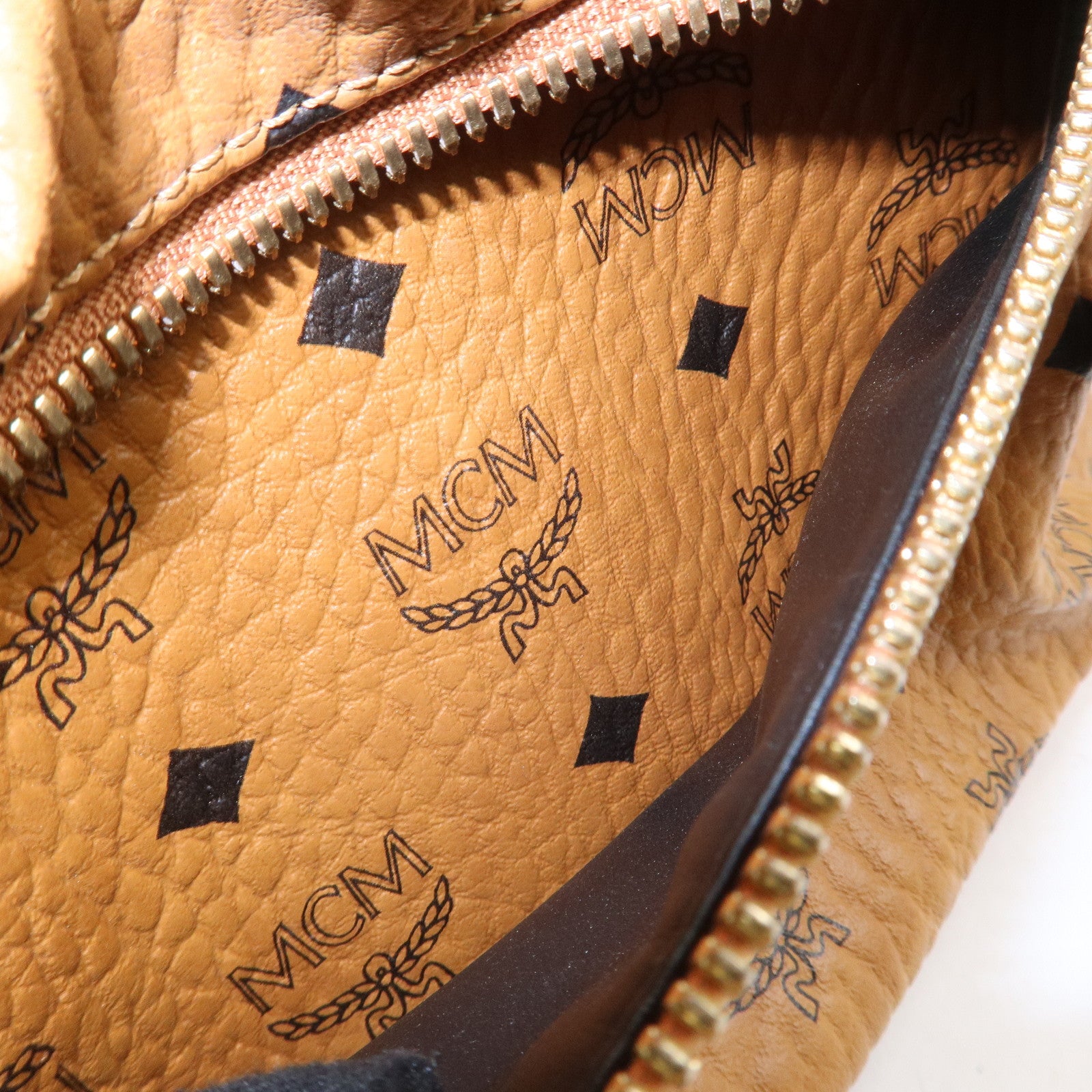 MCM Visetos PVC Leather Backpack Rucksack Studs Cognac