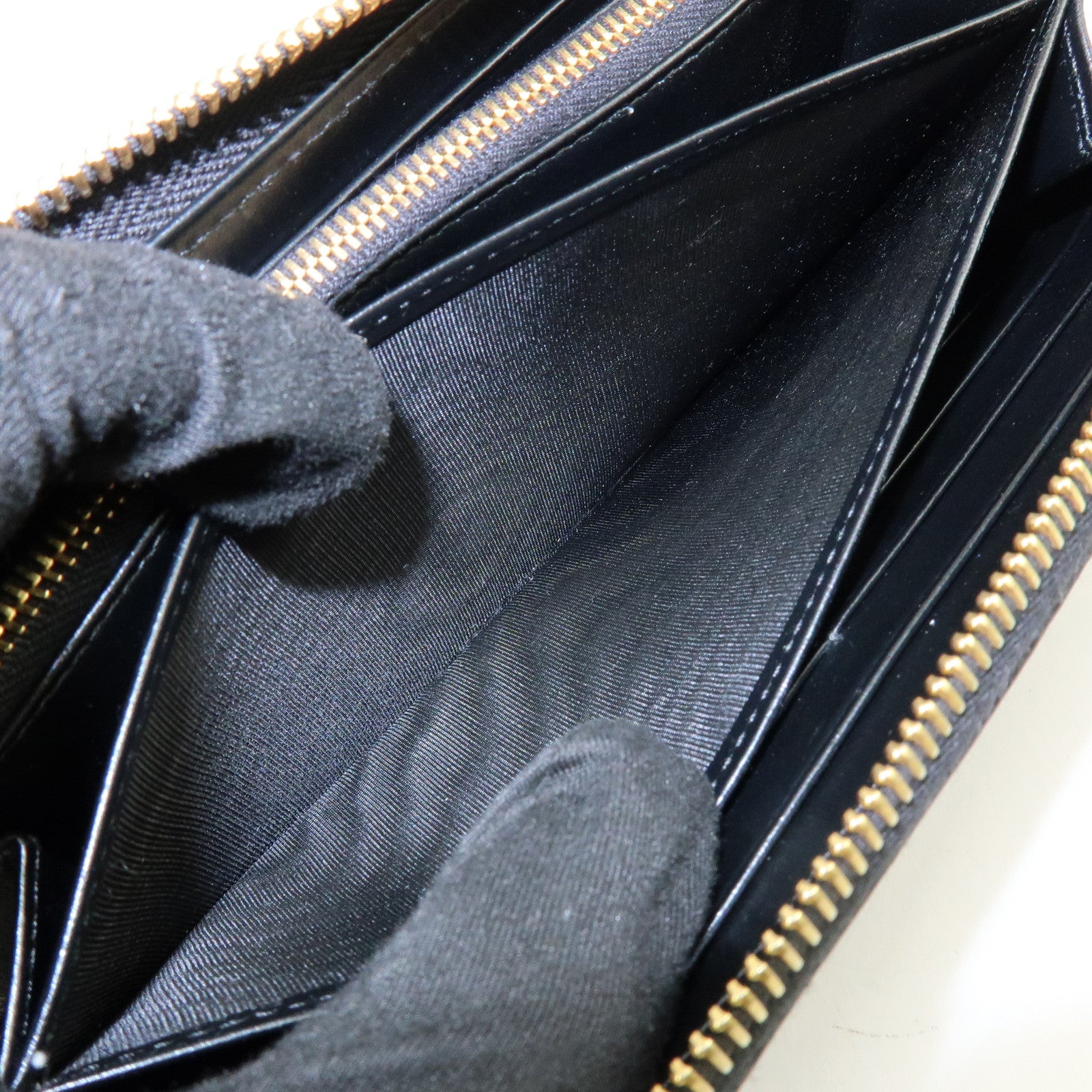 PRADA Ribbon Logo Leather Round Zippy Long Wallet Black