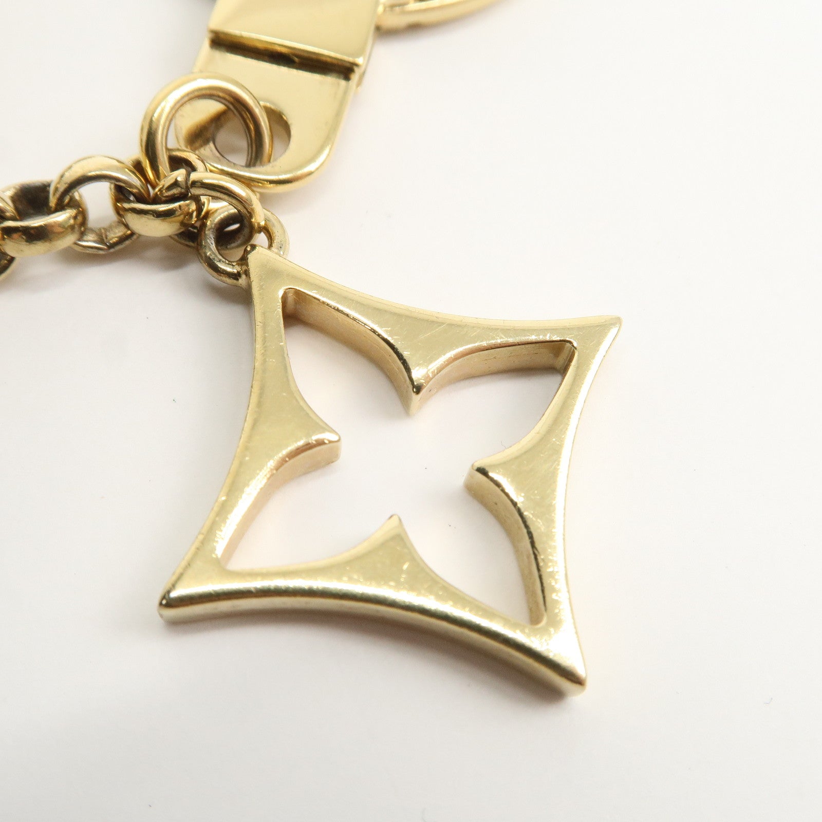 Louis Vuitton Fleur de Monogram Bag Charm Key Chain Gold M65111