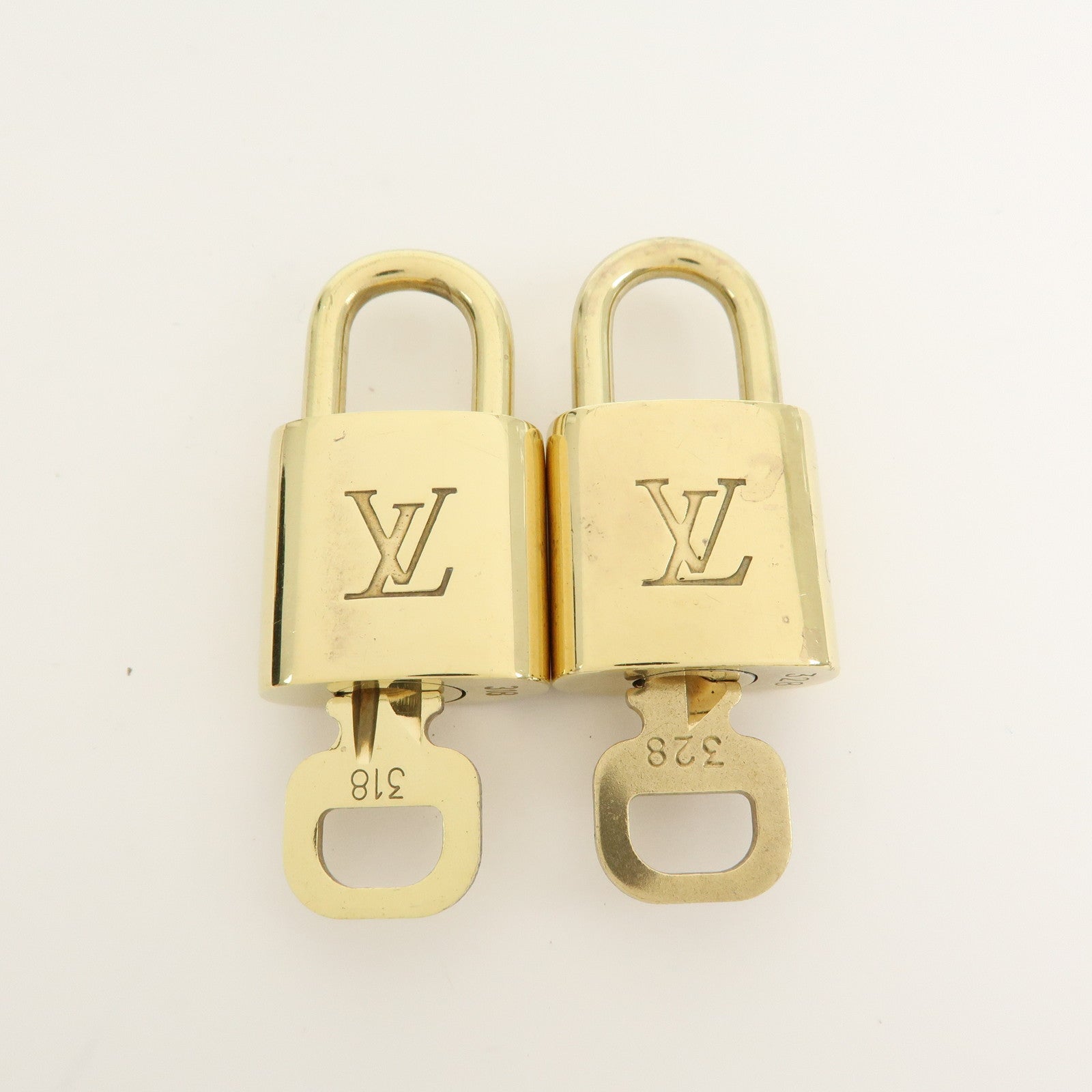 Louis Vuitton Set of 10 Lock & Key Cadena Key Lock Gold