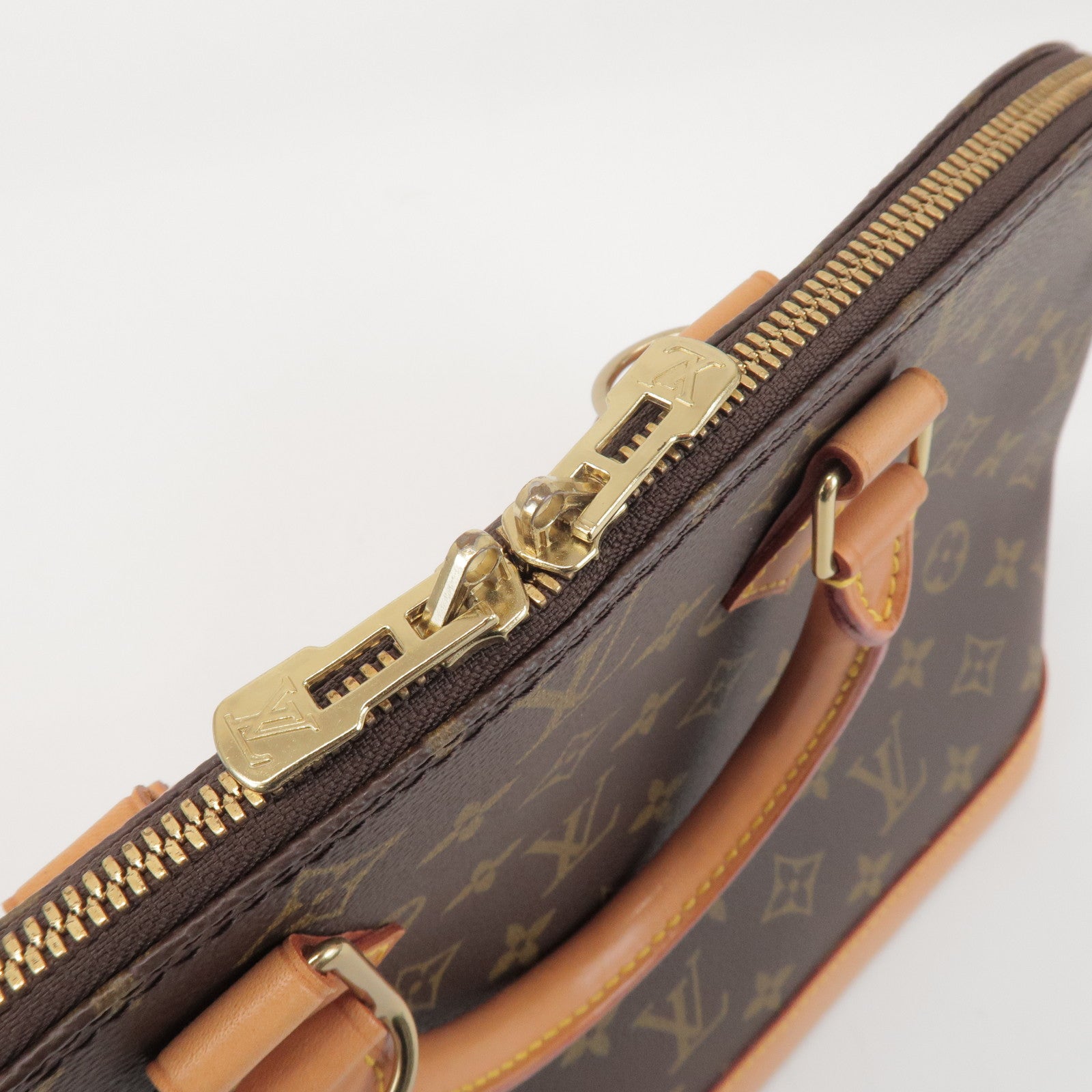 Louis Vuitton Monogram Alma Hand Bag Brown M51130