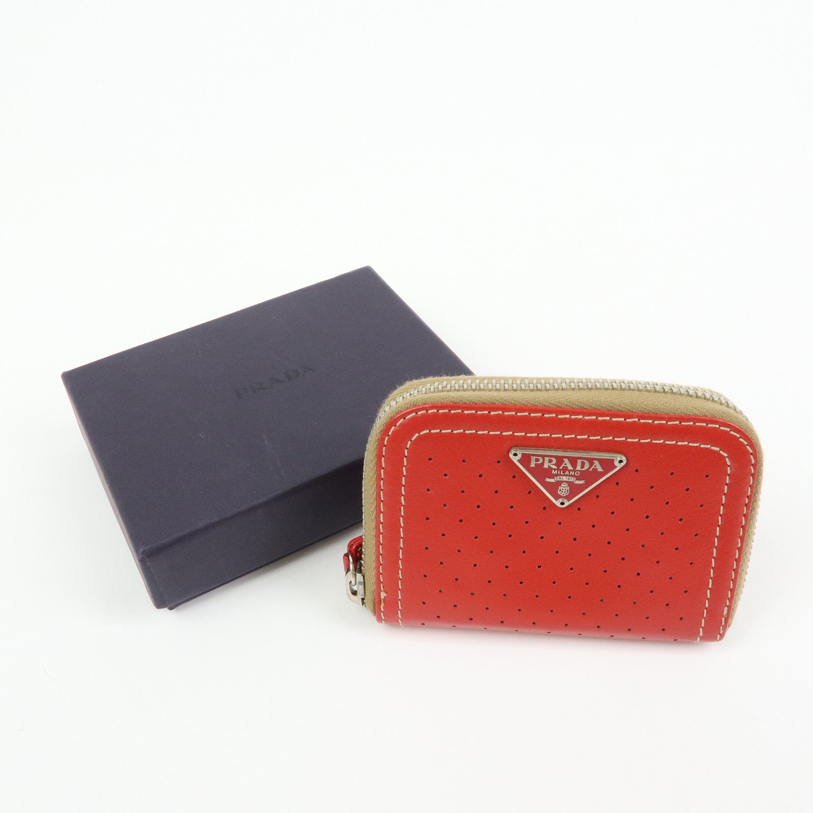 PRADA Triangle Logo Punched Leather Round Zippy Coin Case Red