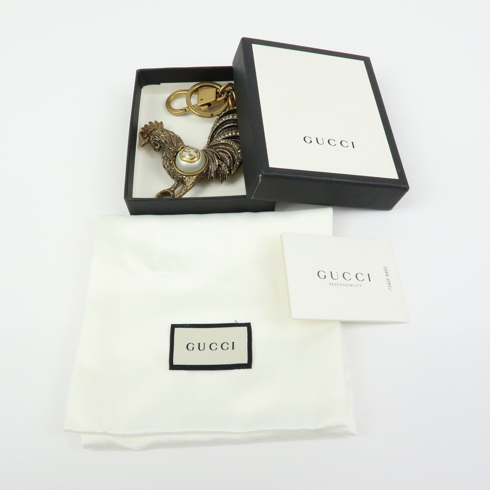 GUCCI Interlocking G Metal Rhinestone Faux Pearl Bag Charm Gold