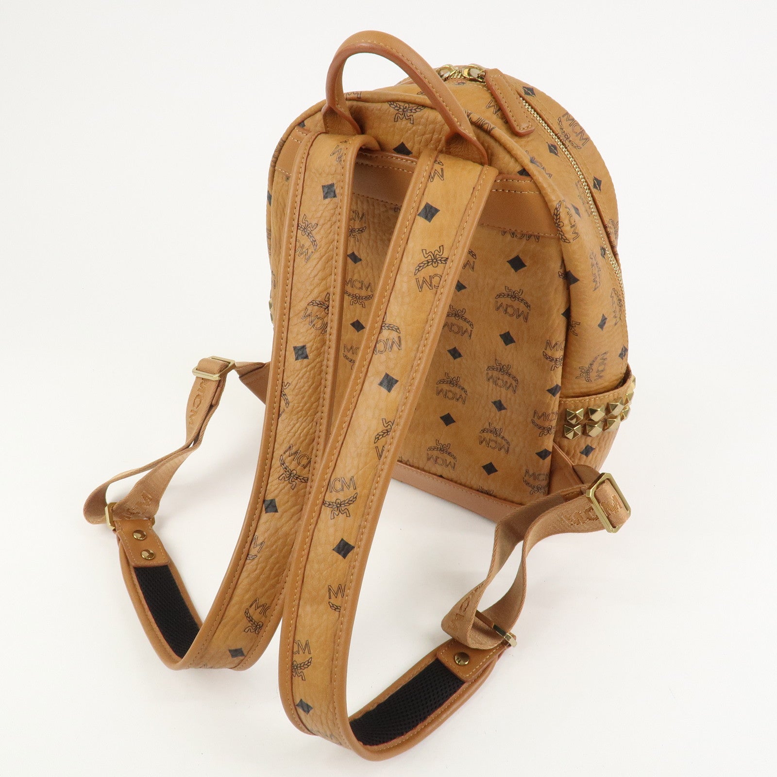 MCM Visetos PVC Leather Backpack Rucksack Studs Cognac
