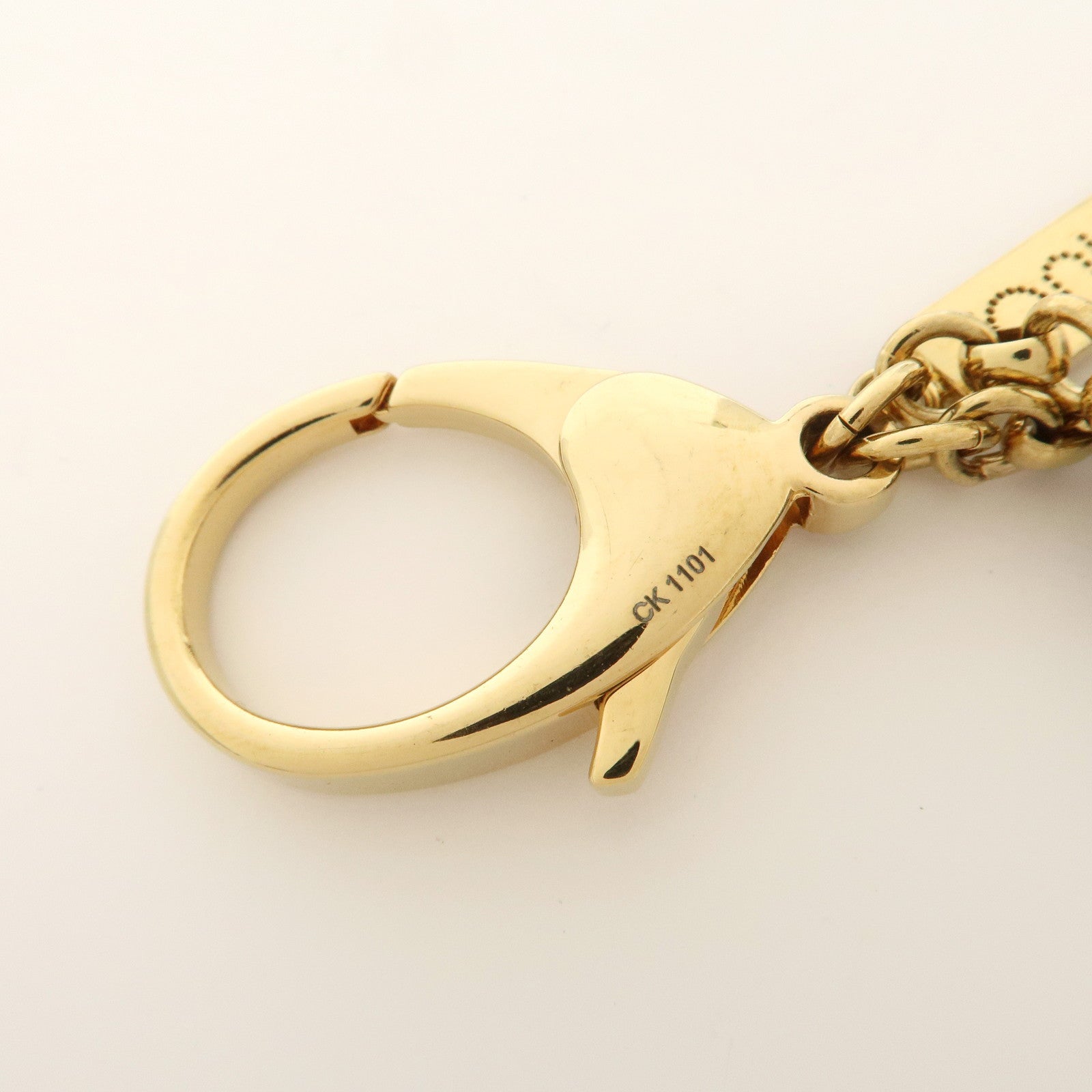 Louis Vuitton Monogram Bijoux Sac Tapage Bag Charm Gold M66350