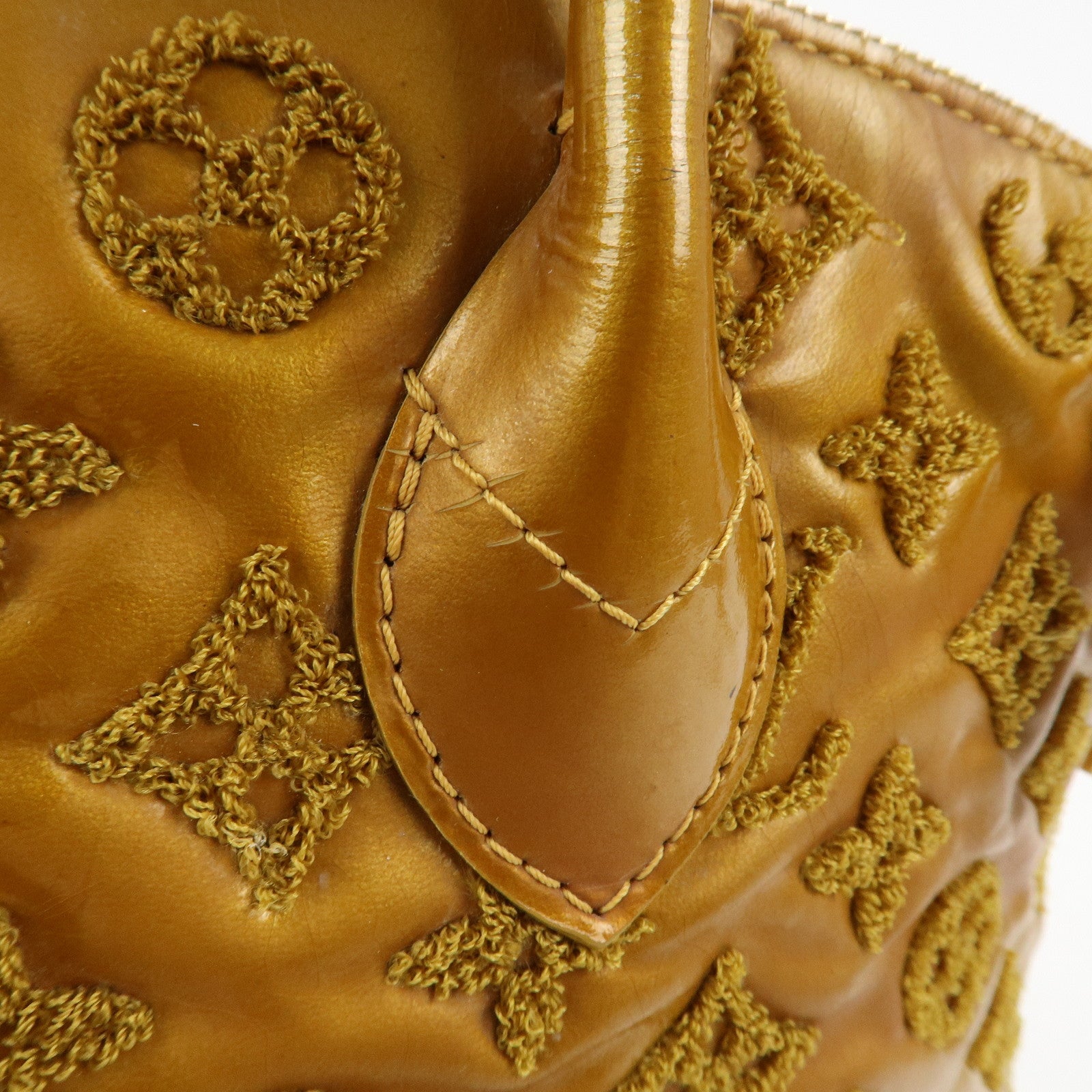 Louis Vuitton Monogram Lockit Bouclette Hand Bag Gold M40601