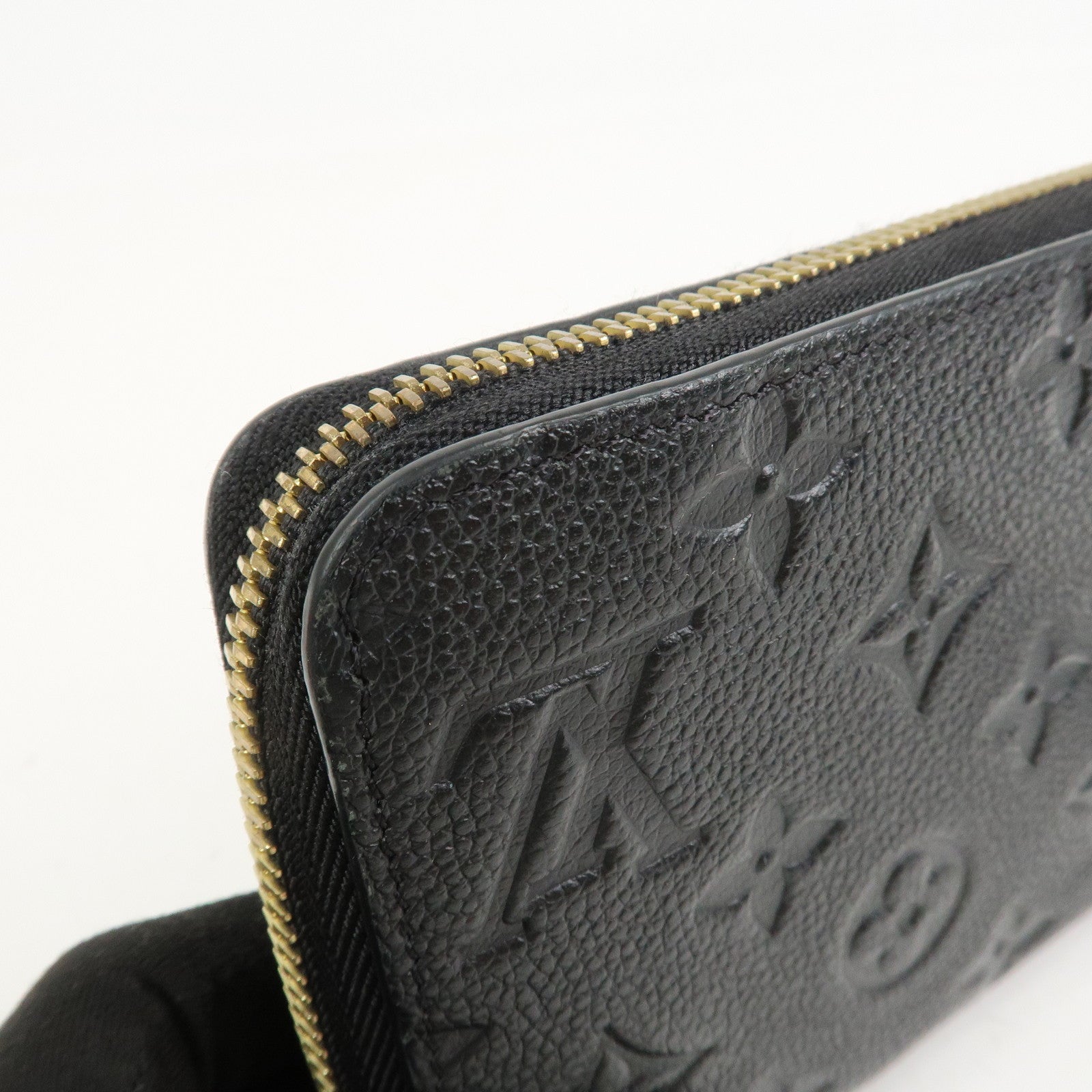 Louis Vuitton Monogram Empreinte Leather Round Zippy Wallet M61864