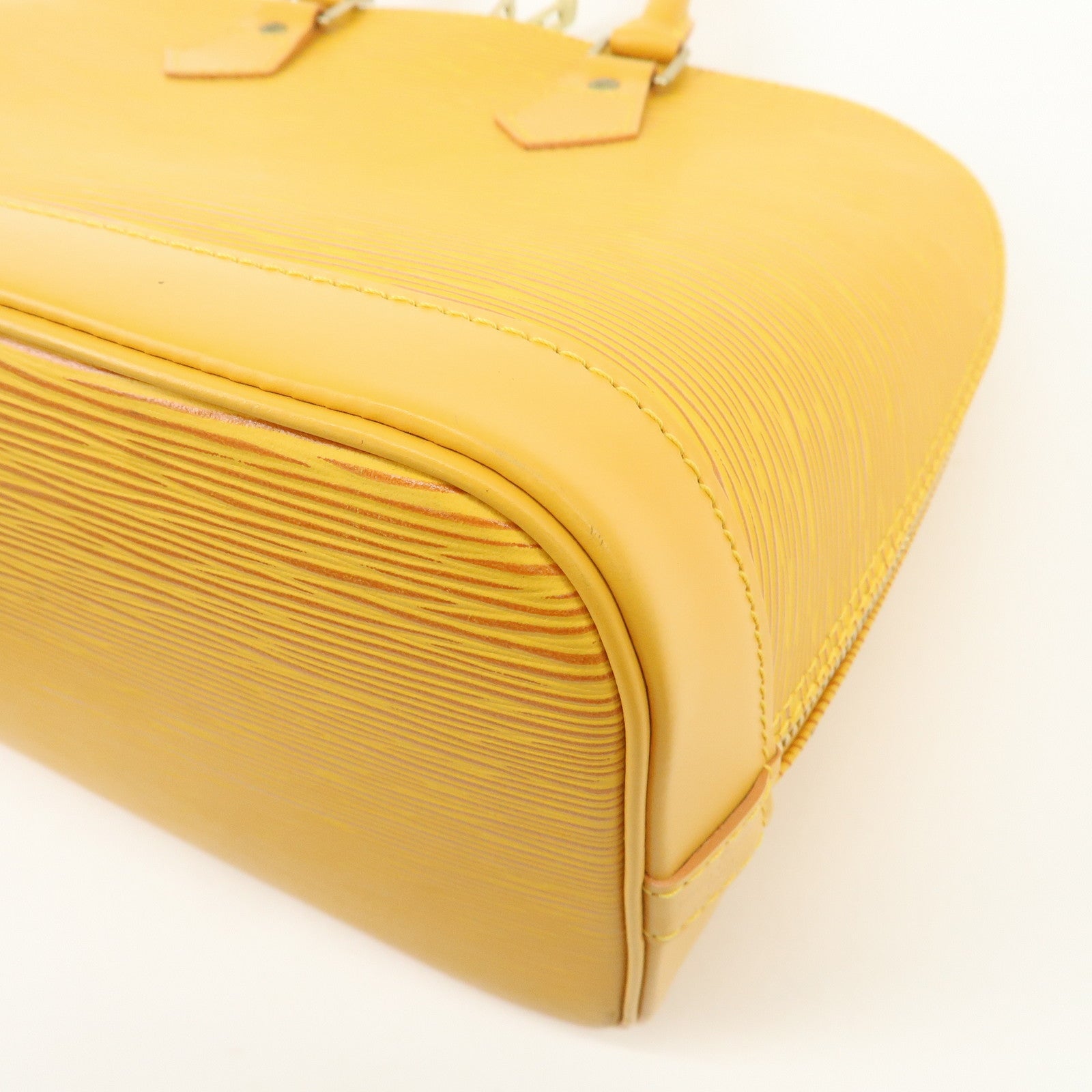 Louis Vuitton Epi Alma PM Hand Bag Tassili Yellow M52149