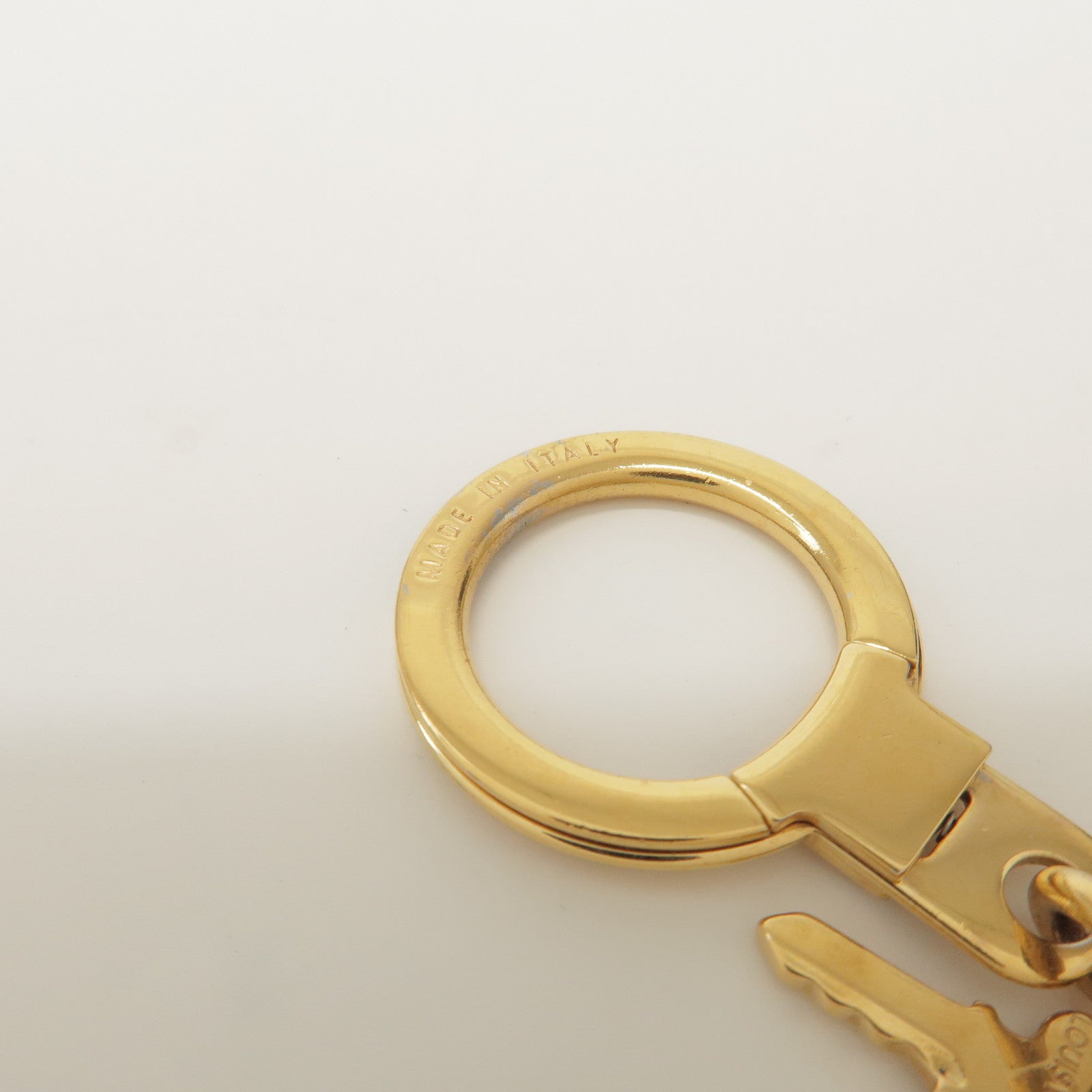 Louis Vuitton Porte Cles Pompille Metal Bag Charm Gold Red M91928