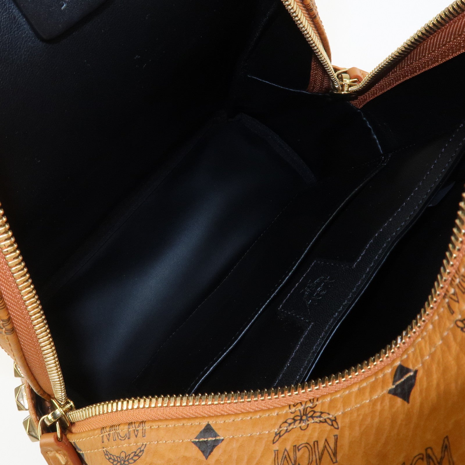 MCM Visetos PVC Leather Backpack Rucksack Studs Cognac