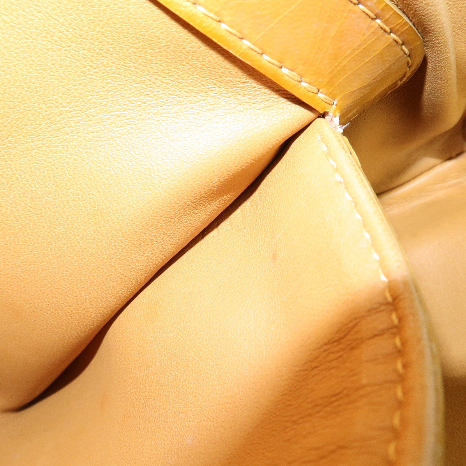 Louis Vuitton Monogram Lockit Bouclette Hand Bag Gold M40601