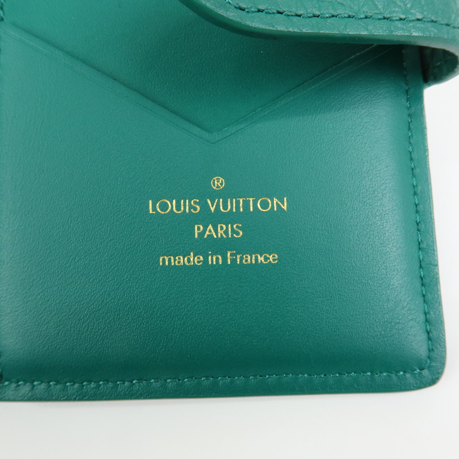 Louis Vuitton Taurillon Leather Vertical Compact Wallet M82438
