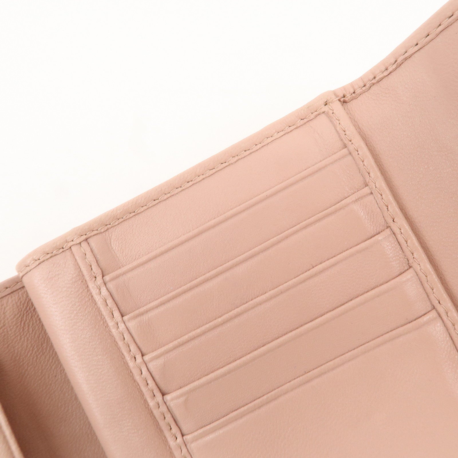 MIU MIU Matelasse Leather Round Zipper Bi-fold Wallet Pink