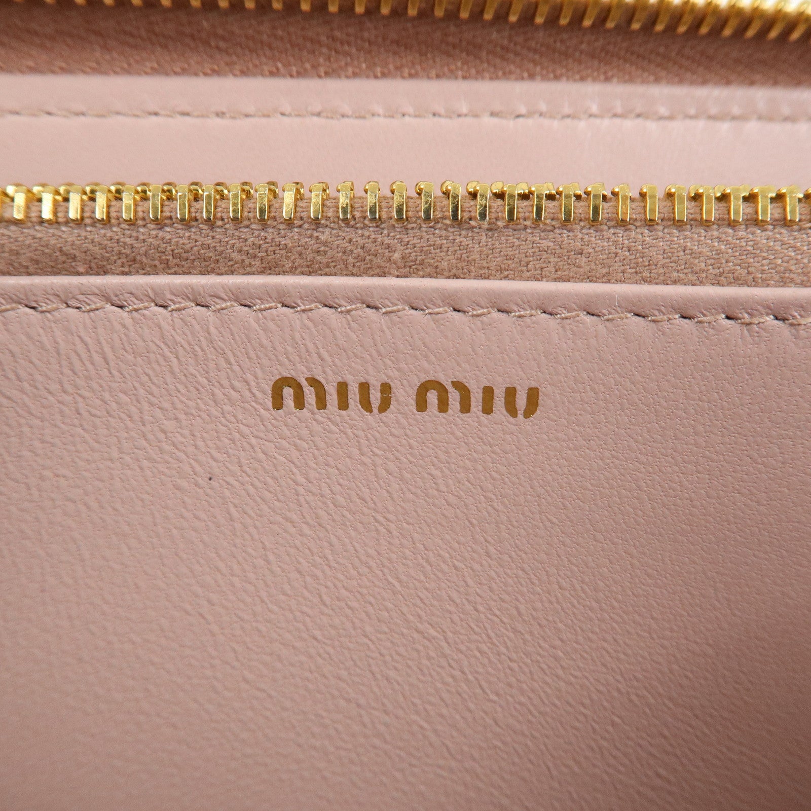 MIU MIU Matelasse Leather Round Zipper Long Wallet Pink Beige