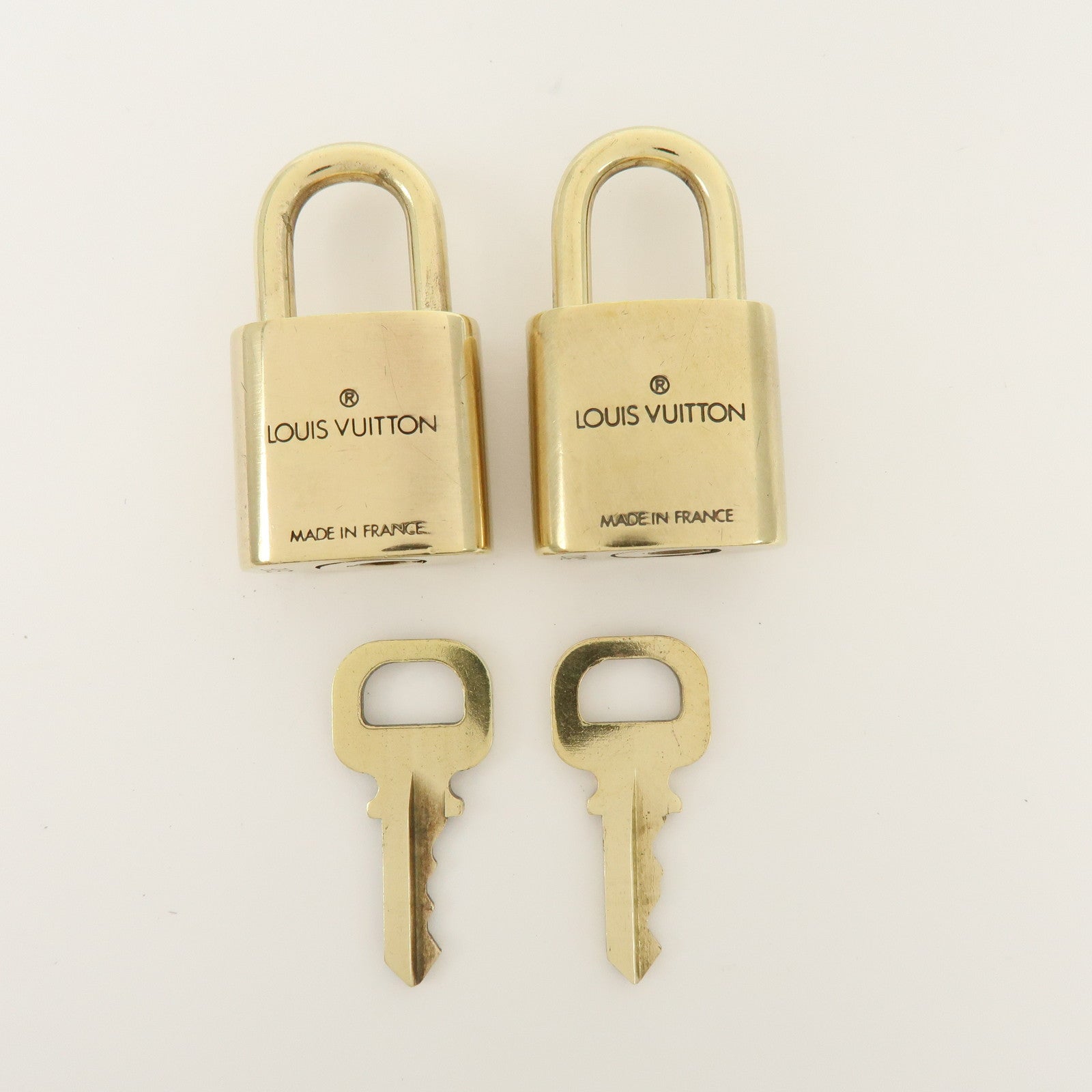 Louis Vuitton Set of 10 Metal Lock & Key Cadena Key Lock Gold