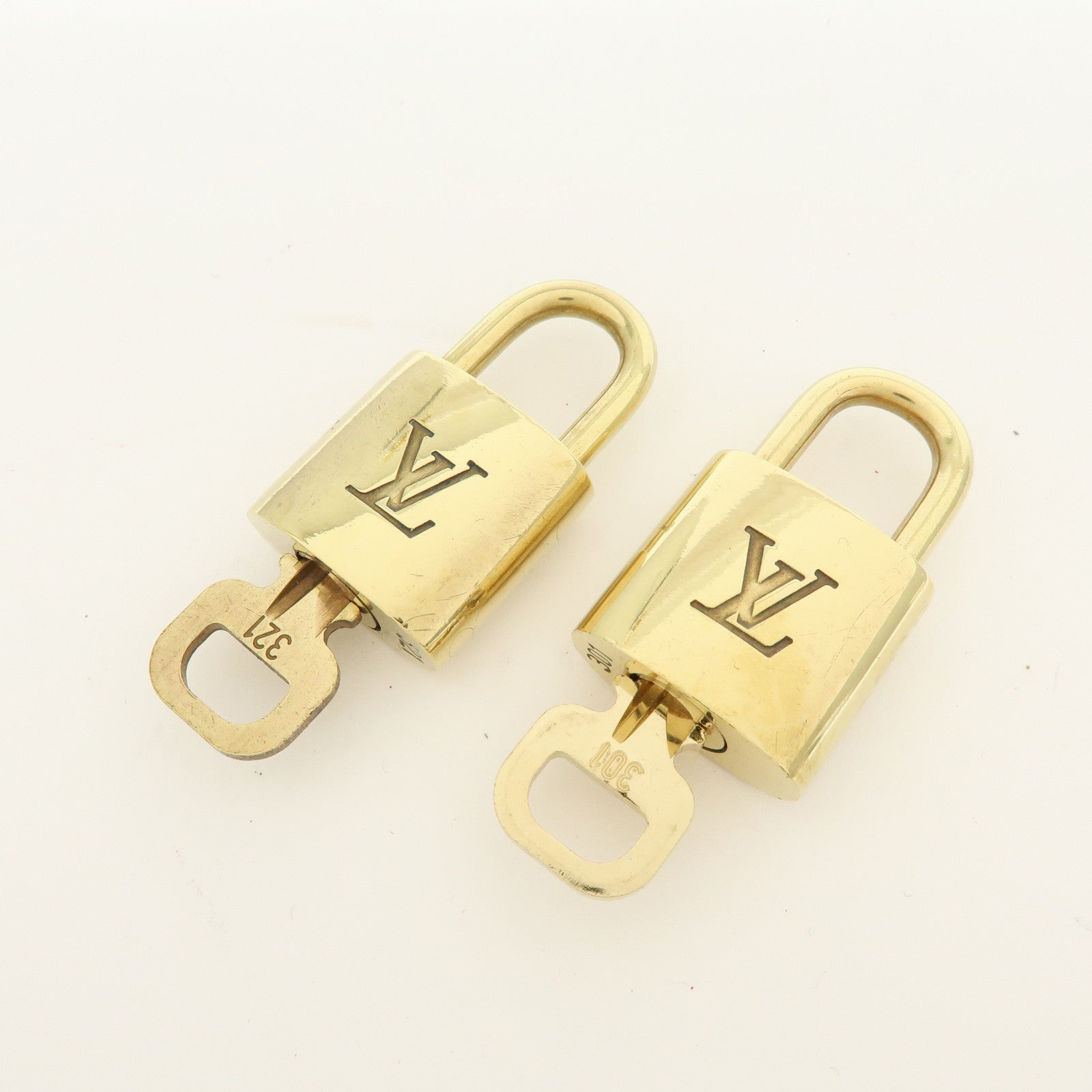 Louis Vuitton Lot of 10 Metal Lock & Key Cadena Key Lock Gold