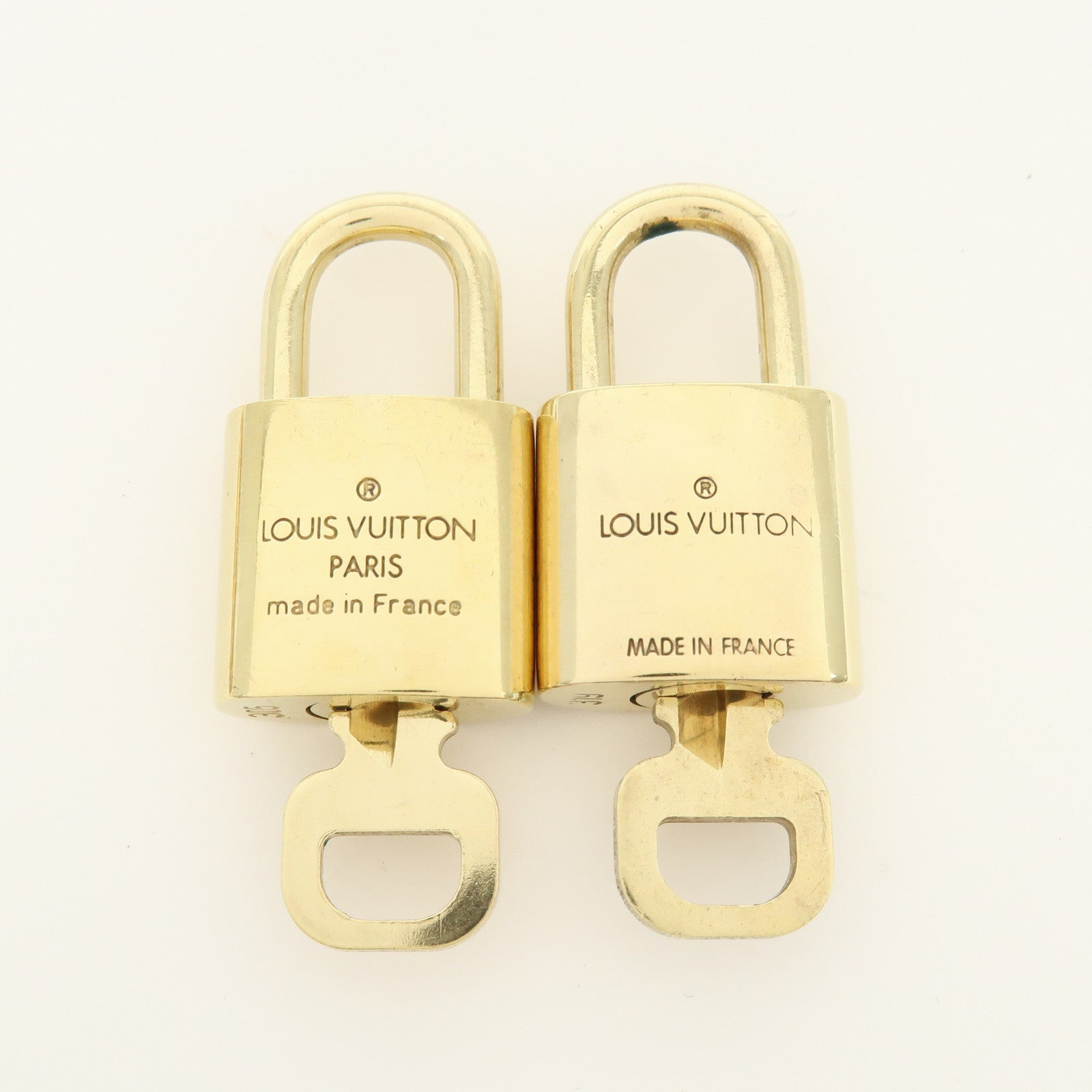 Louis Vuitton Lot of 10 Lock & Key Cadena Key Lock Gold