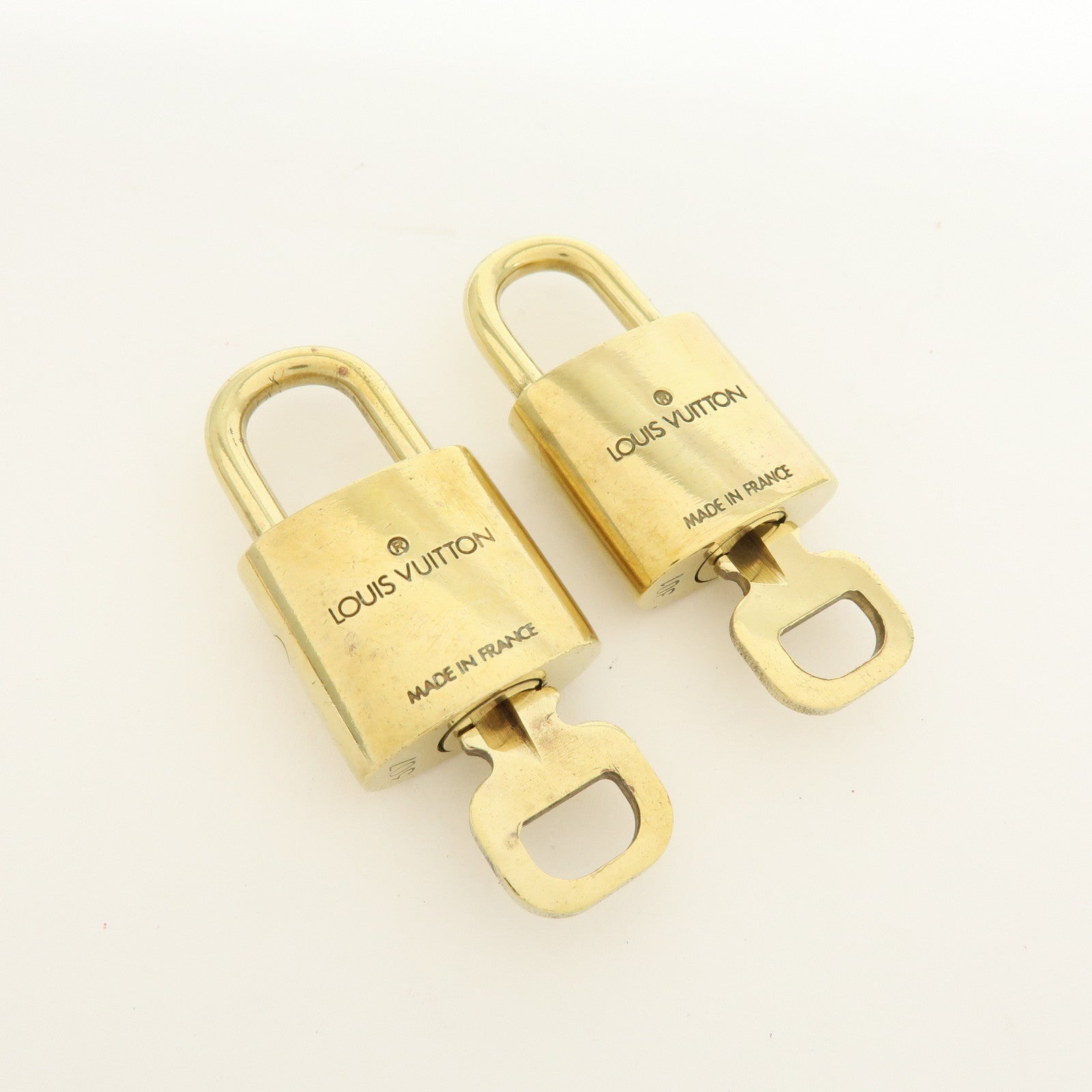 Louis Vuitton Lot of 10 Metal Lock & Key Cadena Key Lock Gold