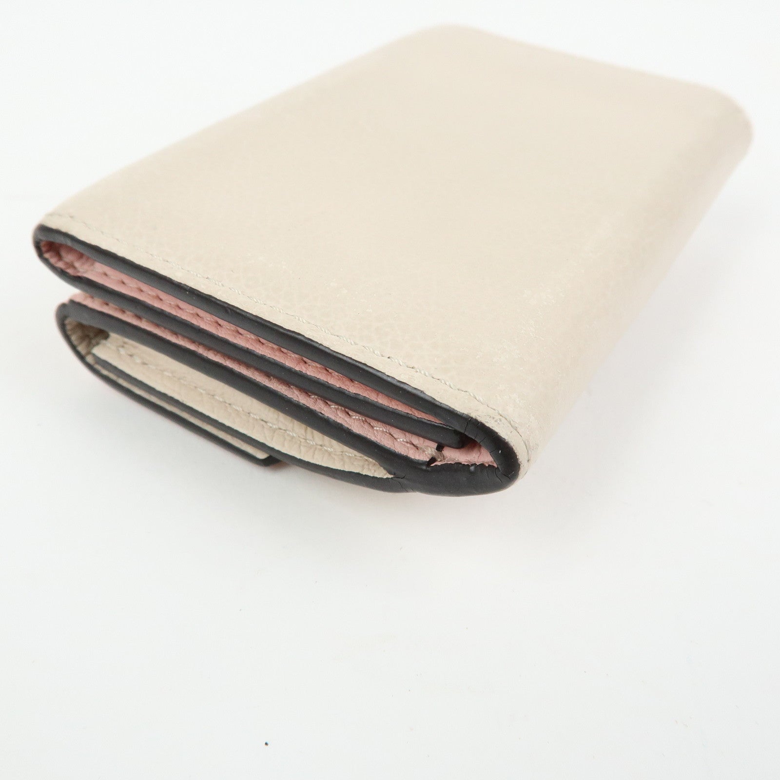 Louis Vuitton Portefeuille Lockmini Taurillon Compact Wallet M80785
