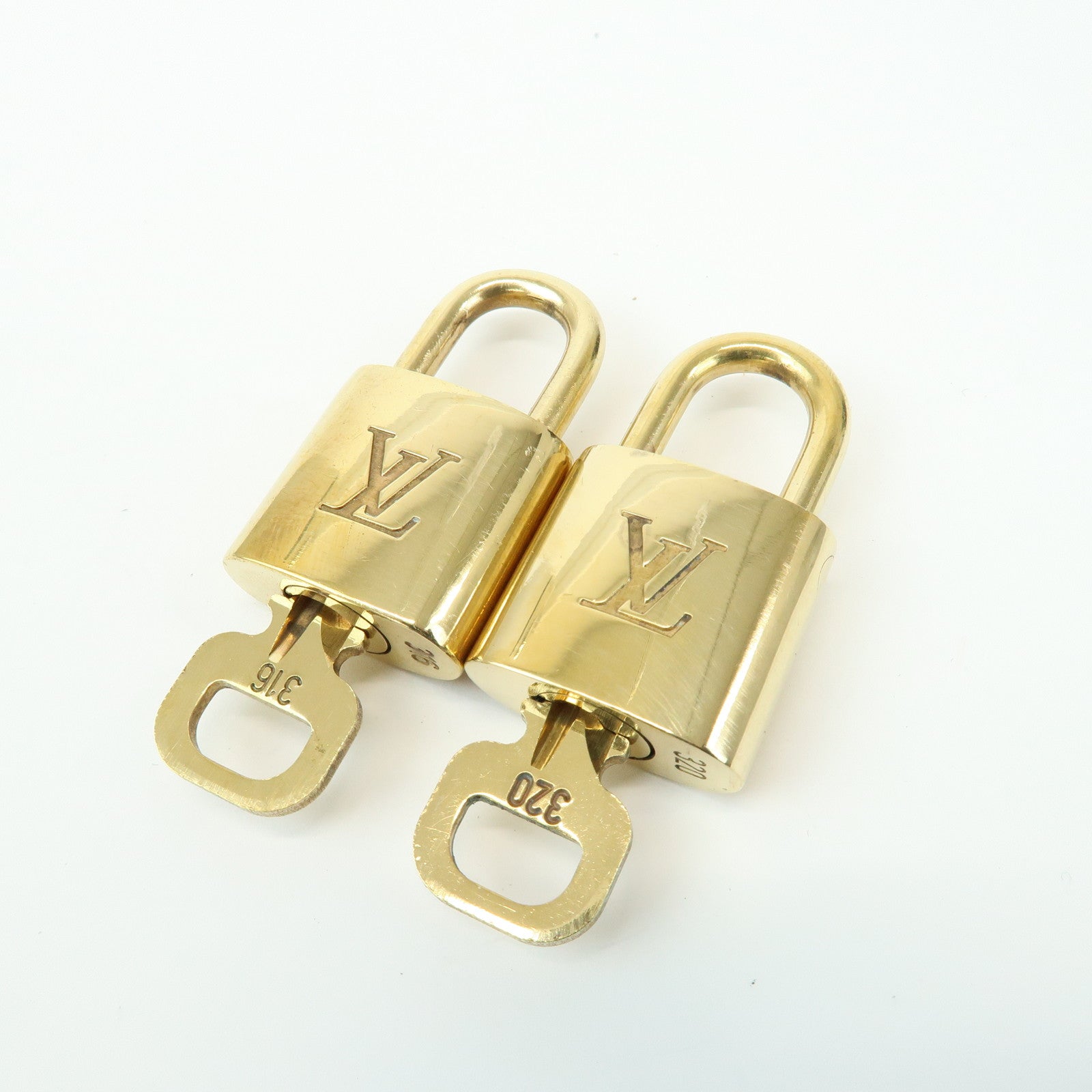 Louis Vuitton Set of 10 Lock & Key Cadena Key Lock